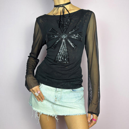 The Y2K Black Embellished Mesh Top is a statement vintage 2000s piece. This sheer top features a bold black sequin and bead embellishment in a striking cross pattern on the front. The lightweight mesh fabric and long sleeves. adult world shop