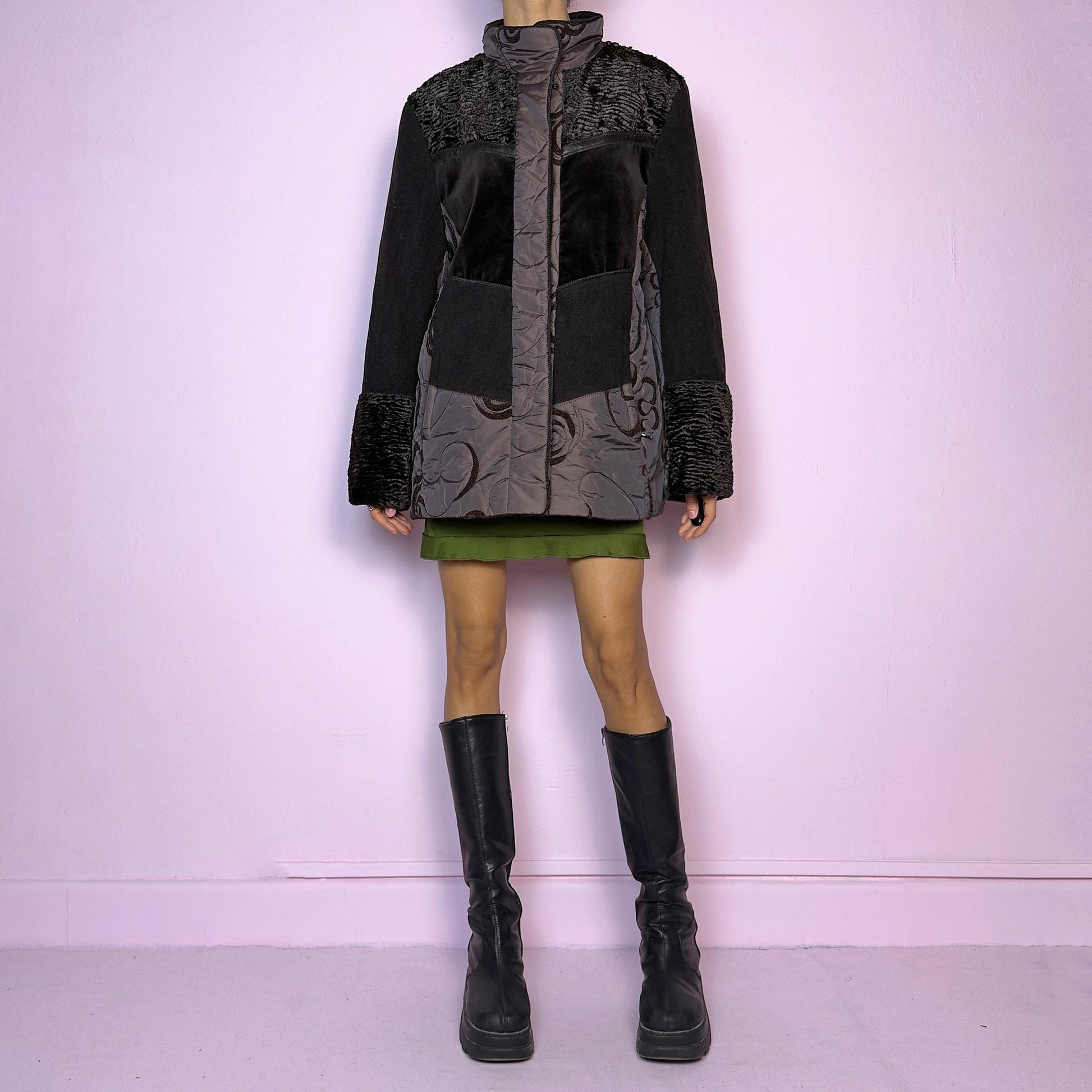 The Y2K Brown Contrast Panel Jacket is a vintage 2000s piece featuring a striking mixed-material design in dark brown with textured panels, including quilted, faux fur, and velvety fabric sections. It comes with a zipper and snap button closure