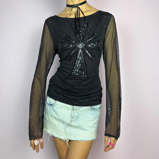 The Y2K Black Embellished Mesh Top is a statement vintage 2000s piece. This sheer top features a bold black sequin and bead embellishment in a striking cross pattern on the front. The lightweight mesh fabric and long sleeves. adult world shop