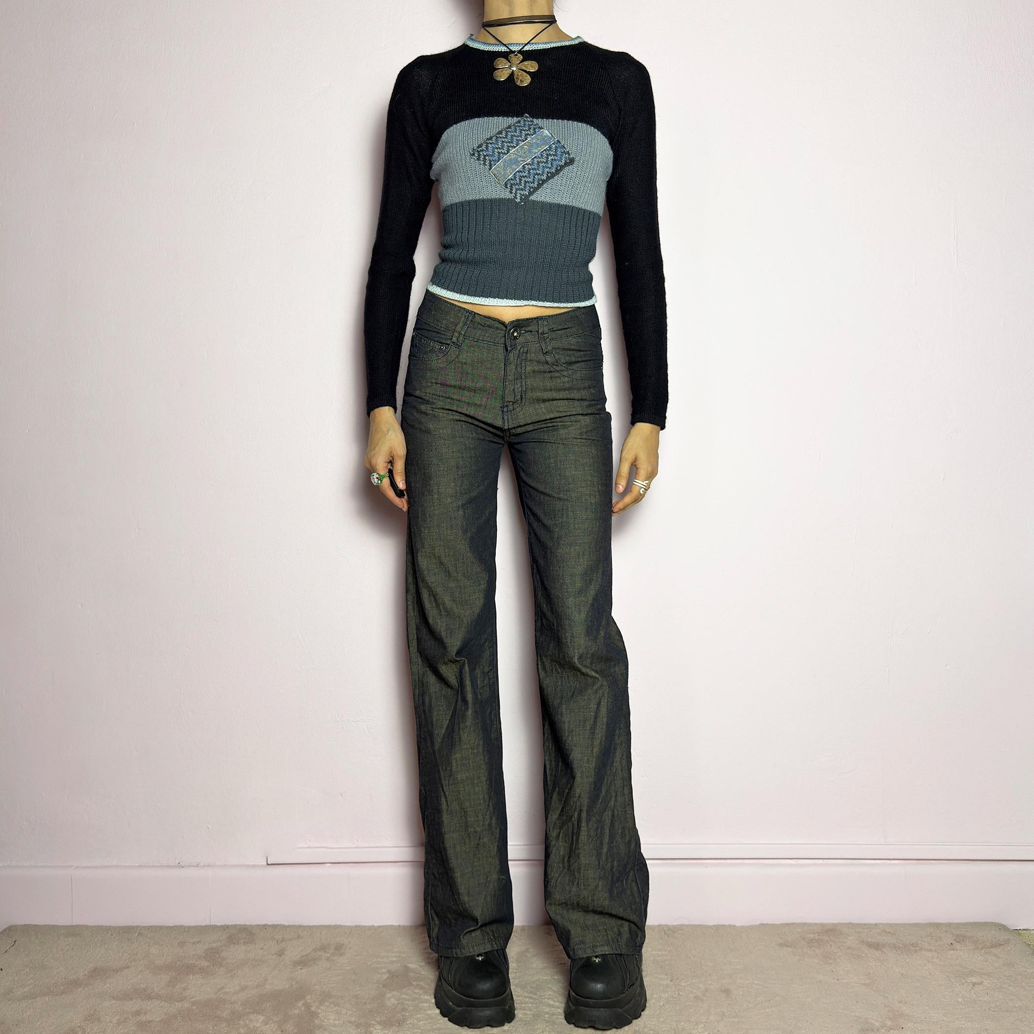 The Y2K Dark Rust Wide Jeans are a vintage 2000s statement piece featuring a structured denim fabric with a unique rust-effect wash, adding a worn-in, vintage appeal. Designed with a high-rise fit, button and zipper closure, and pockets, these jeans have a relaxed wide-leg silhouette that creates an effortlessly cool look. Perfect for edgy streetwear and casual outfits. adult world shop