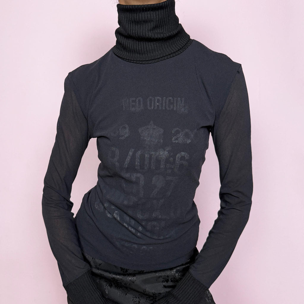 Vintage 2000s black mesh sheer long sleeve top with a ribbed knit turtleneck and ribbed cuffs, featuring a subtle text lettering print visible through the underlayer. Stretchy and fitted with a cyber-futuristic and minimalist feel, ideal for streetwear, grunge outfits, and autumn layering. Made from a polyester wool polyamide blend. Excellent vintage condition.