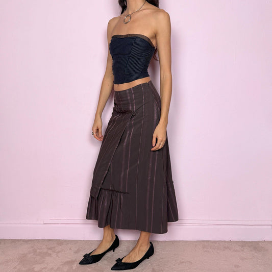 Vintage 2000s brown pinstripe midi skirt with deconstructed layered design and subtle pink stripes. Features side zip closure, ruffle hem, and structured no-stretch fabric. Can be worn mid to low rise for XXS/XS or high waisted for S. Very unique fairycore grunge futuristic piece with elegant edge. Excellent vintage condition.