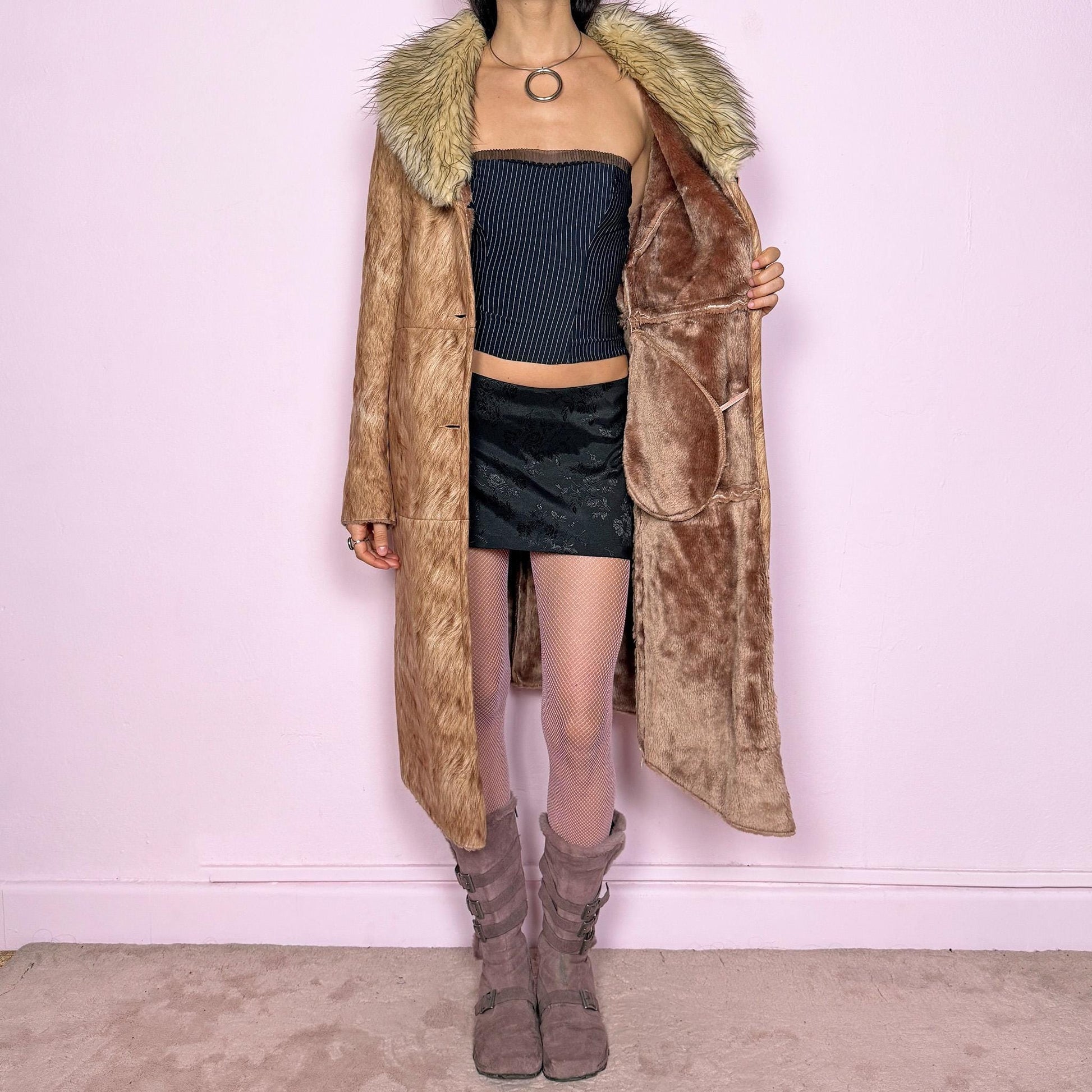 Penny Lane–inspired vintage 2000s long brown and beige faux fur coat with button closure, fur-print pattern, soft faux fur collar and pockets. Unique bold statement piece with no stretch, ideal for festivals, events, or winter parties. Excellent vintage condition.