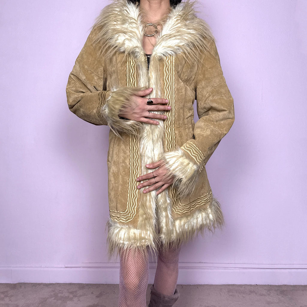 Stunning Afghan-inspired vintage 2000s beige Penny Lane faux fur winter coat with hook front closure, pockets, faux fur collar, cuffs, and interior. Features detailed embroidery and boho 70s-inspired silhouette. Made from polyester. Excellent vintage condition.