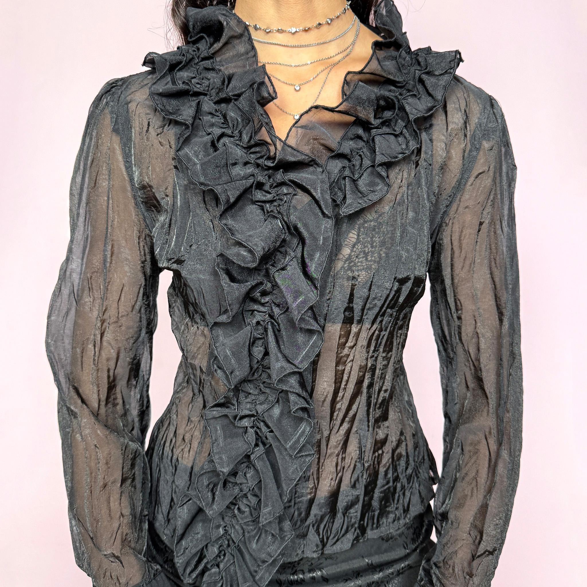 Vintage 90s sheer tailored blouse in black with a subtle dark green undertone depending on the light. Features a ruffled neckline, V-neck cut, button-front closure, and elegant silhouette with no stretch. Ideal for formal evenings, gothic glam, or Victorian romance styling. Great vintage condition.