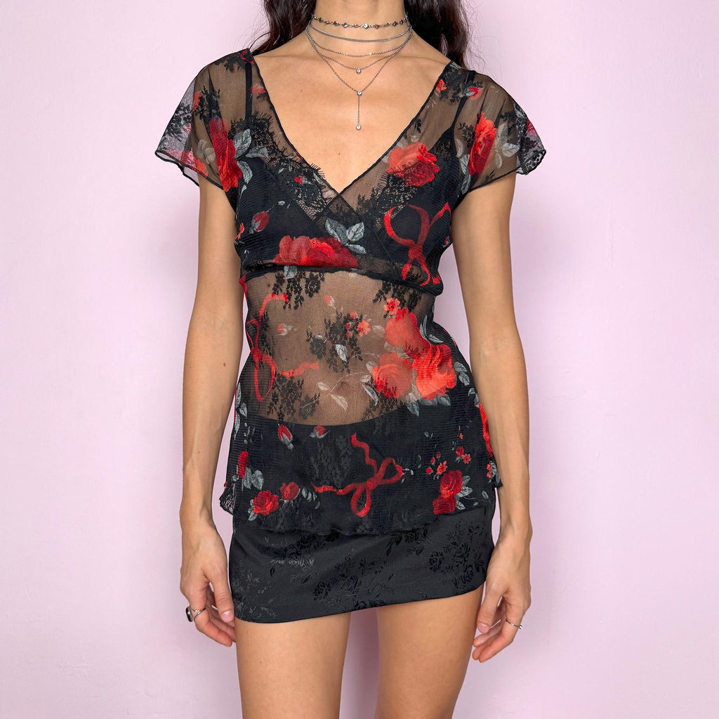 Dark romance vintage 2000s black sheer mesh wrap top with deep V neckline and red rose print. Stretchy fitted silhouette with soft, lightweight feel, perfect for night outs, date looks, or coquette party styling. Whimsical and romantic aesthetic. Excellent vintage condition.
