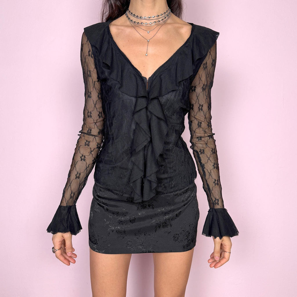 Dark romance vintage 2000s black lace blouse with sheer bell sleeves, ruffled V-neckline, and hook front closure. A whimsical fairy goth piece perfect for night outings, parties, or elegant events. Non-stretch fabric. By a French brand. Excellent vintage condition.