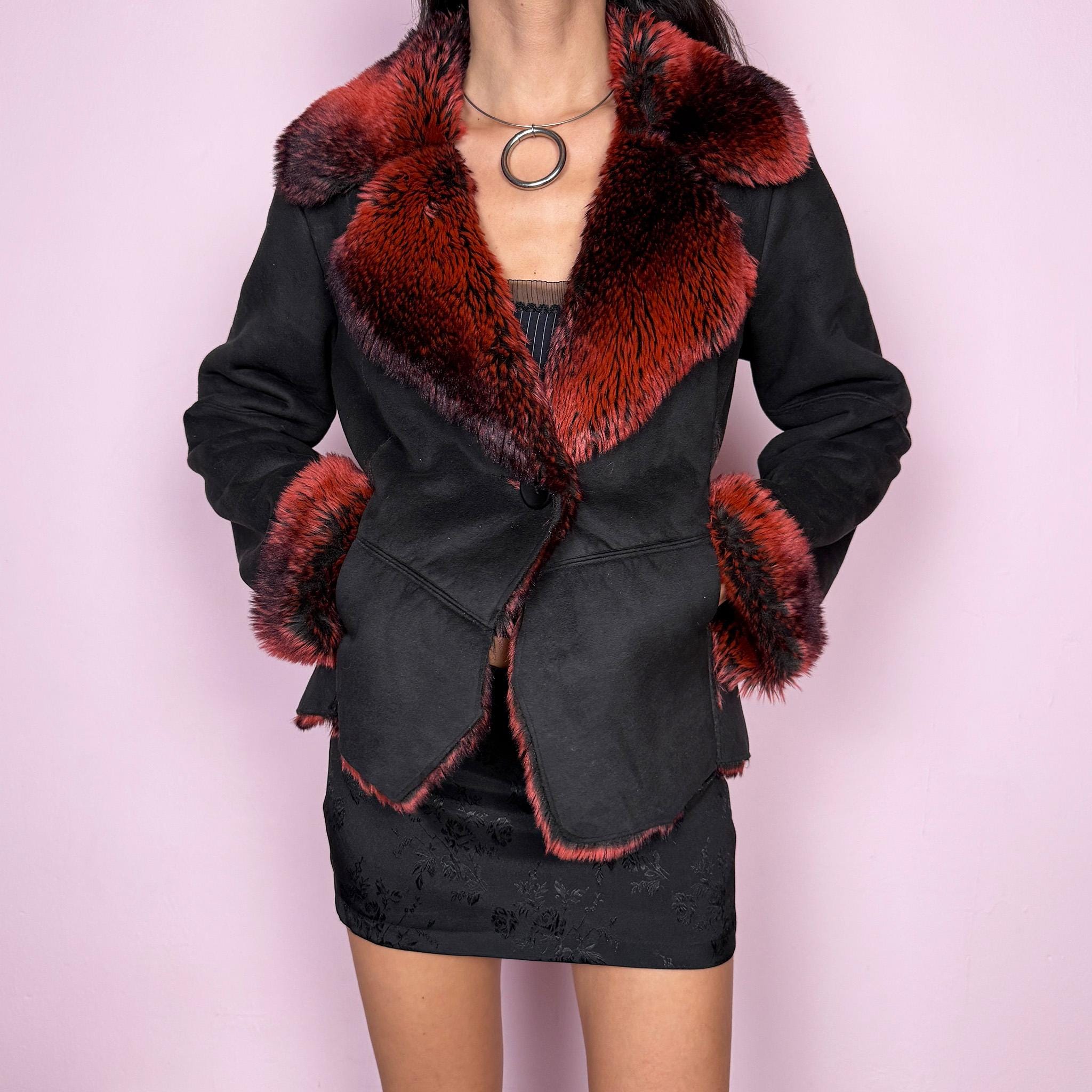 Stunning vintage 2000s Penny Lane–inspired jacket featuring a black faux suede exterior with bold red and black faux fur collar and cuffs. Designed with a fitted cut, single button closure, and front pockets. A statement piece made from polyester by a French brand. Excellent vintage condition.