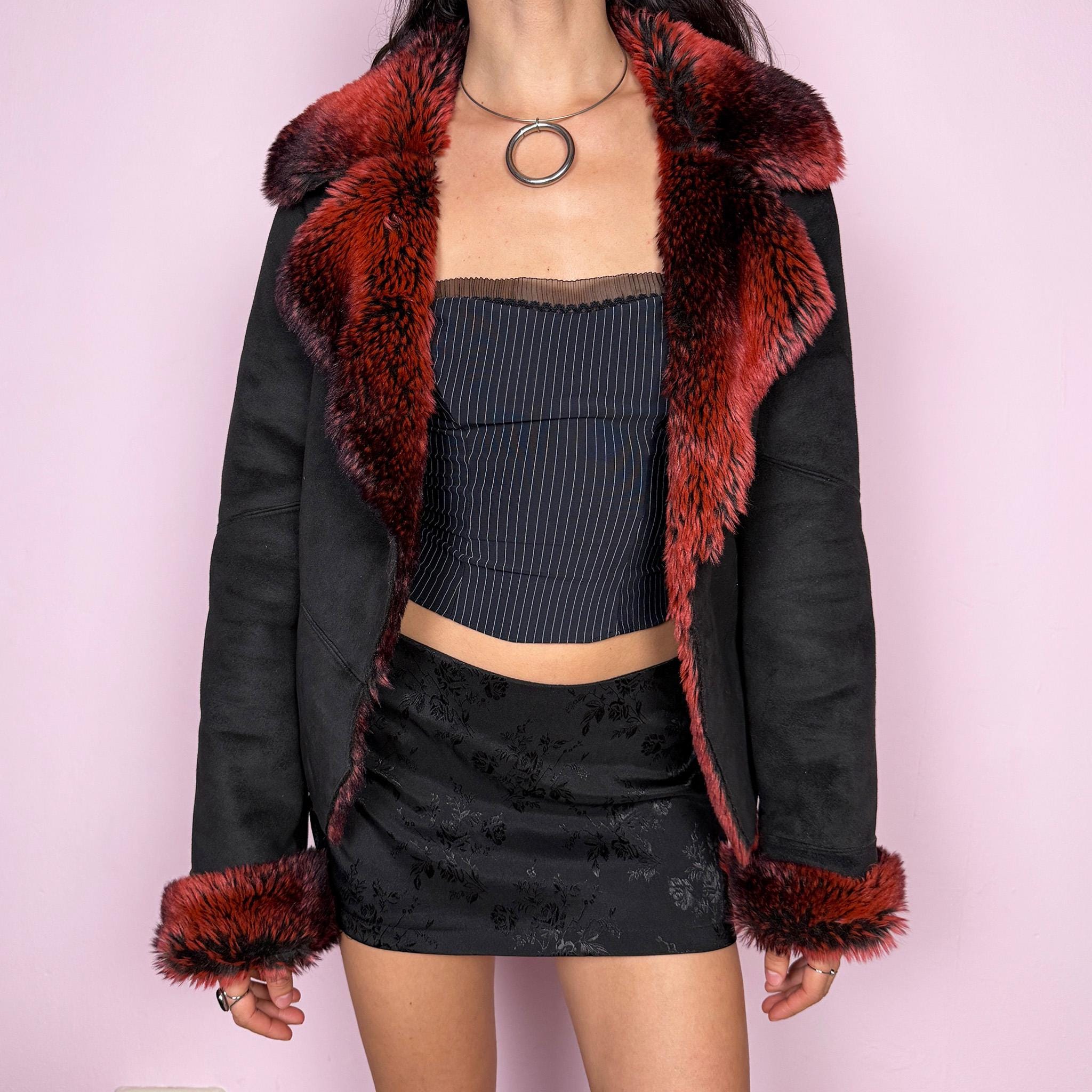 Stunning vintage 2000s Penny Lane–inspired jacket featuring a black faux suede exterior with bold red and black faux fur collar and cuffs. Designed with a fitted cut, single button closure, and front pockets. A statement piece made from polyester by a French brand. Excellent vintage condition.