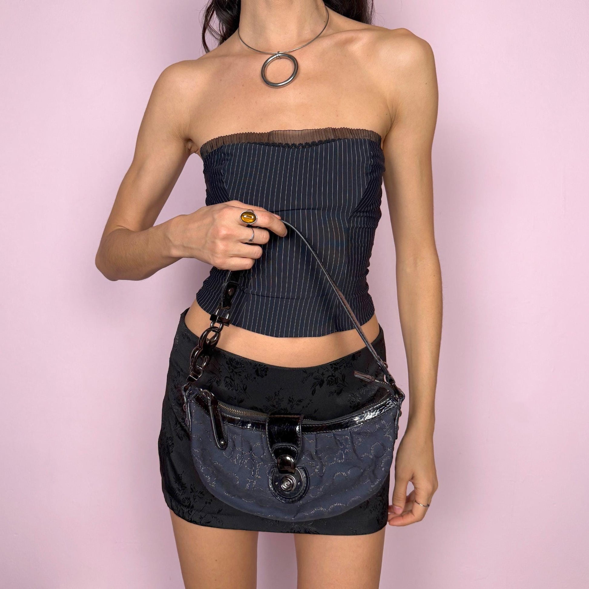 Iconic vintage early 2000s navy blue mini baguette bag by Roccobarocco. Features signature monogram canvas with glossy black patent details, sculptural hardware, zip closure, and push-down turn-lock closure. A quintessential Italian going-out accessory with a bold Y2K silhouette. Made in Italy. Great vintage condition.