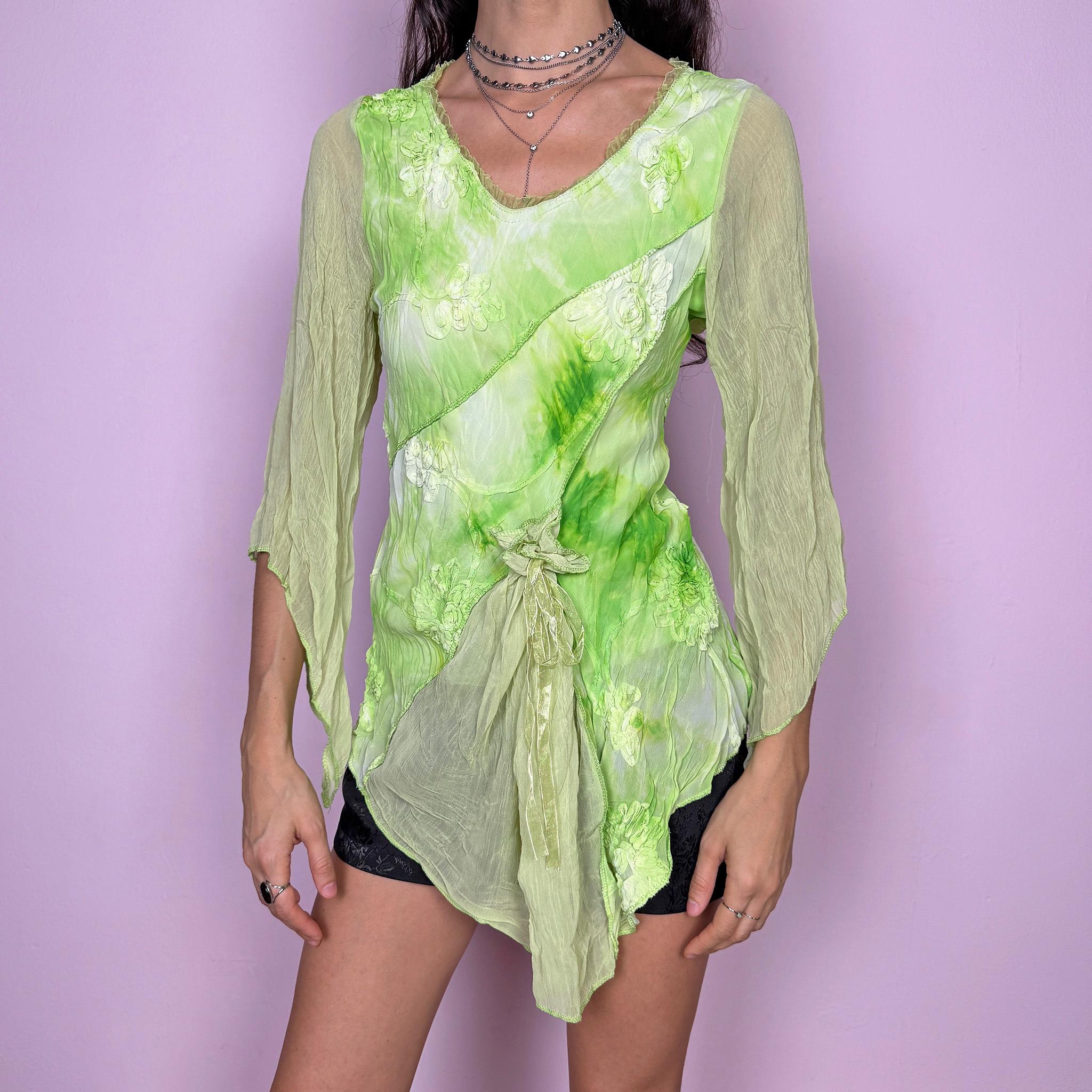 Stunning fairycore vintage 2000s top in many shades of green with a tie dye effect. Features 3/4 bell sleeves, applique details, a draped tie-front design, and an asymmetric pointy hem. Unique flowy silhouette with a bohemian pixie feel, ideal for summer or spring events and festivals. Slightly stretchy fabric. Excellent vintage condition.
