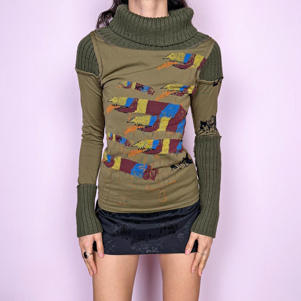 Avant garde vintage 2000s khaki green deconstructed long sleeve top with a knit turtleneck, ribbed knitted cuffs, and patchwork construction. Features multicolored embroidered details with a futuristic dystopian weird girl aesthetic. Ideal for autumn or winter statement layering. Made in Portugal from a stretchy polyamide blend by Desigual. Great vintage condition.
