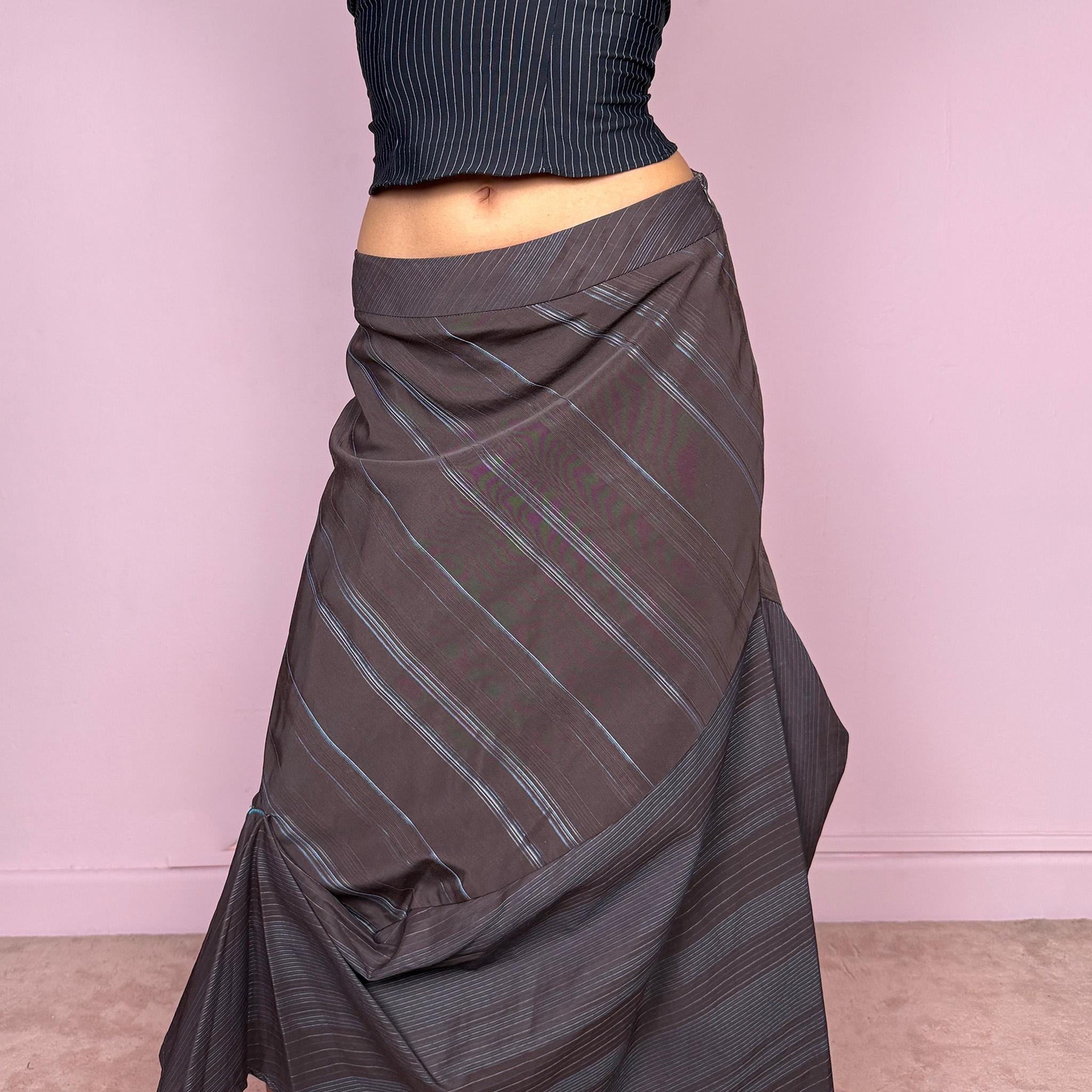 Vintage 2000s deconstructed avant-garde brown midi skirt with a blue diagonal pinstripe pattern and draped details. Features an asymmetrical hem and side zip closure. Structured no-stretch fabric creates a sculptural silhouette. Can be worn mid to low rise for XXS/XS or high-waisted for S. A dark, dystopian, fairycore grunge futuristic piece. Made by a French brand. Excellent vintage condition.
