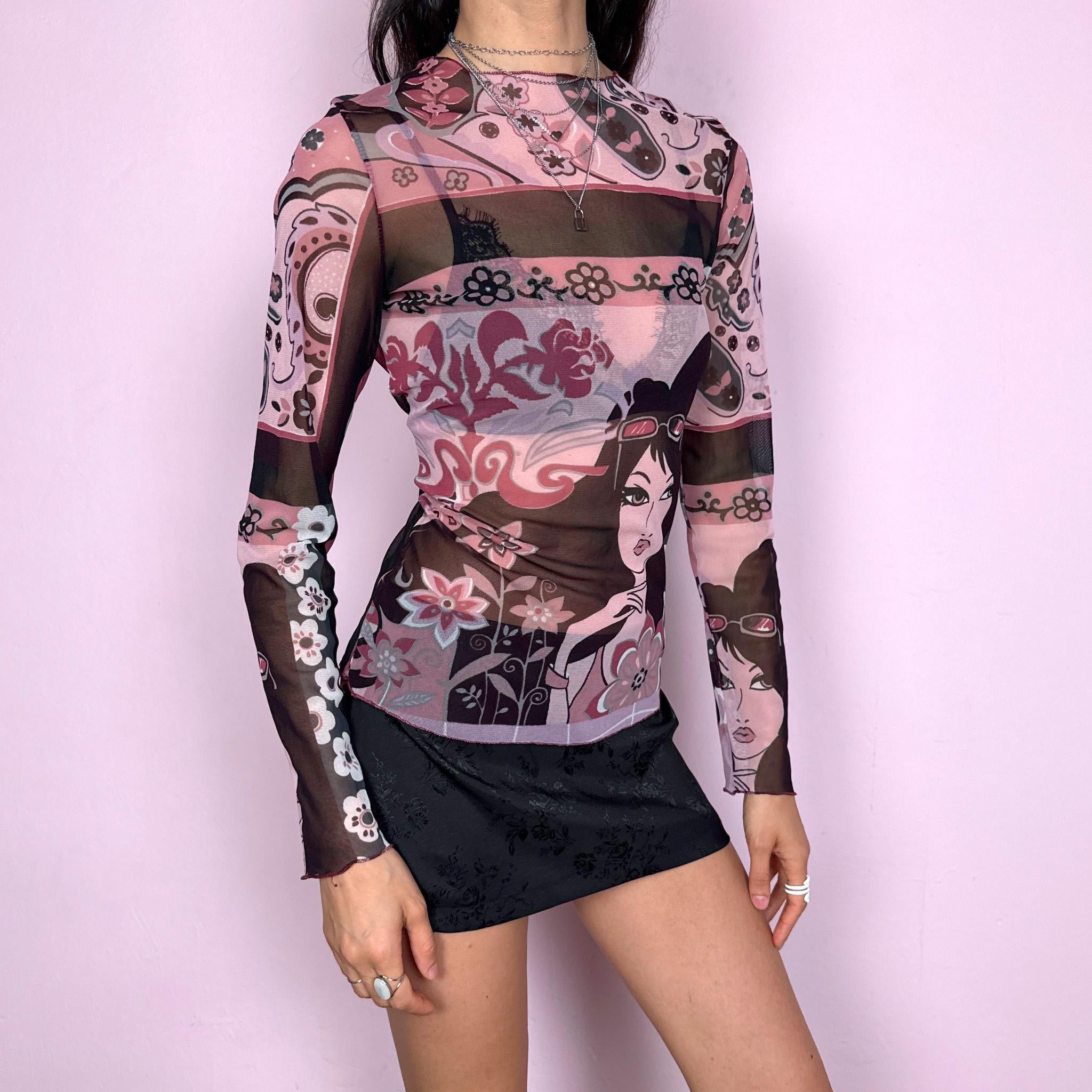 Vintage 2000s maximalist pink burgundy abstract floral graphic print mesh long sleeve semi sheer fitted stretchy top featuring a woman face motif. Lightweight with a bold statement design, perfect for spring or summer layering. Made in France from polyamide. Excellent vintage condition.