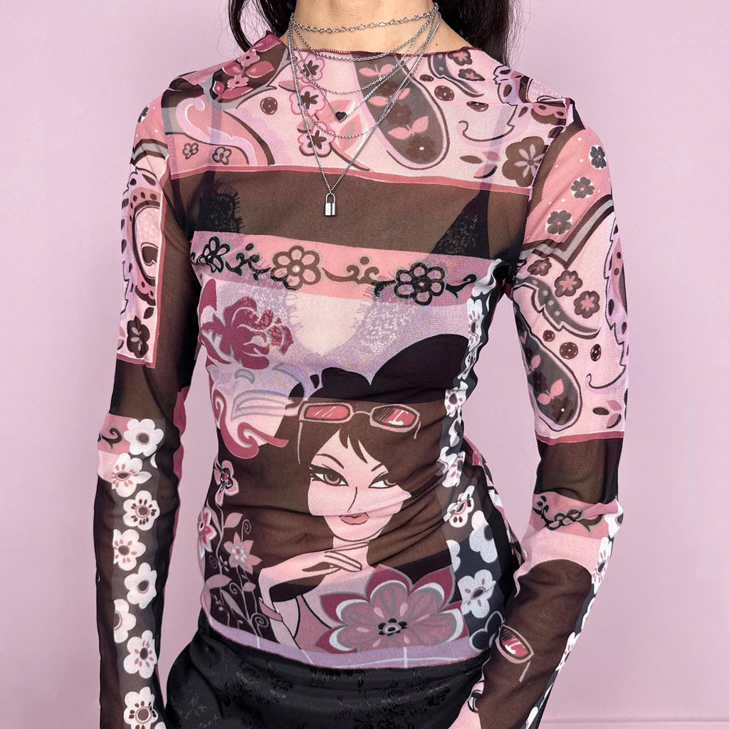 Vintage 2000s maximalist pink burgundy abstract floral graphic print mesh long sleeve semi sheer fitted stretchy top featuring a woman face motif. Lightweight with a bold statement design, perfect for spring or summer layering. Made in France from polyamide. Excellent vintage condition.