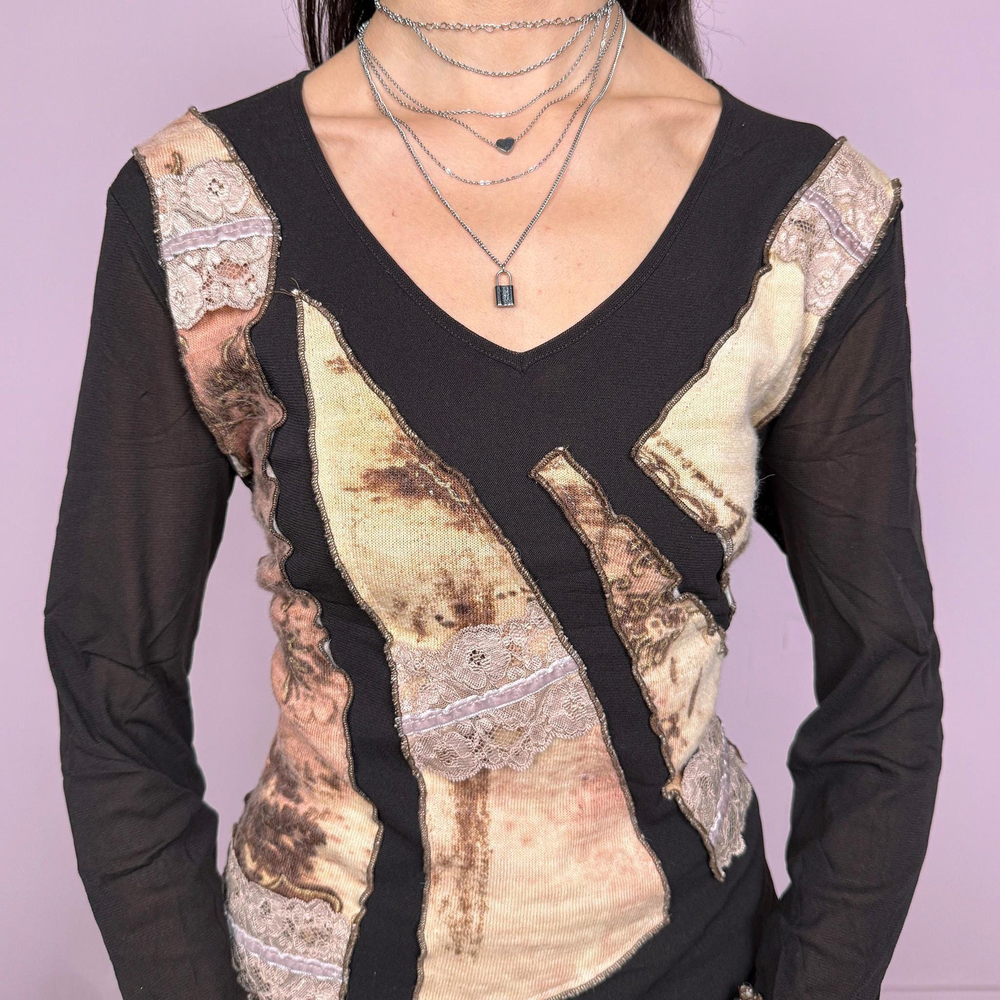 Vintage 2000s avant garde dark brown mesh long sleeve stretchy fitted top with a V-neck and wool appliqué details. Features a semi sheer base with raw edge paneling and textured contrast inserts for a unique deconstructed look. Perfect for spring or autumn layering. Made in Italy. Excellent vintage condition.