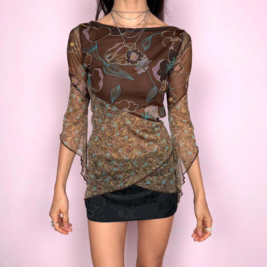 Vintage 2000s whimsical fairycore brown mesh 3/4 bell sleeve stretchy top with an asymmetric hem and two contrasting floral prints. Features a semi sheer lightweight feel with a fitted silhouette and flowing sleeves for a romantic look. Perfect for spring or summer wear. Made by a French brand. Excellent vintage condition.