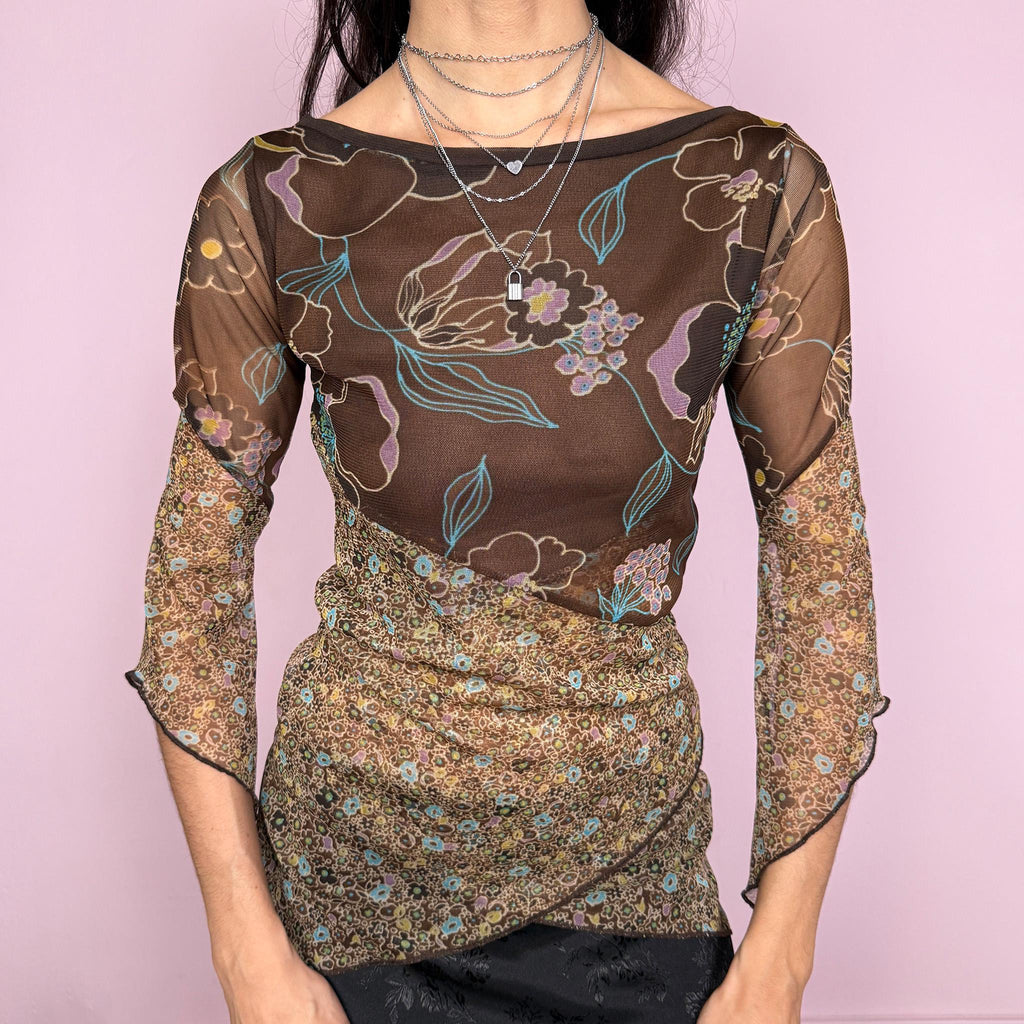 Vintage 2000s whimsical fairycore brown mesh 3/4 bell sleeve stretchy top with an asymmetric hem and two contrasting floral prints. Features a semi sheer lightweight feel with a fitted silhouette and flowing sleeves for a romantic look. Perfect for spring or summer wear. Made by a French brand. Excellent vintage condition.