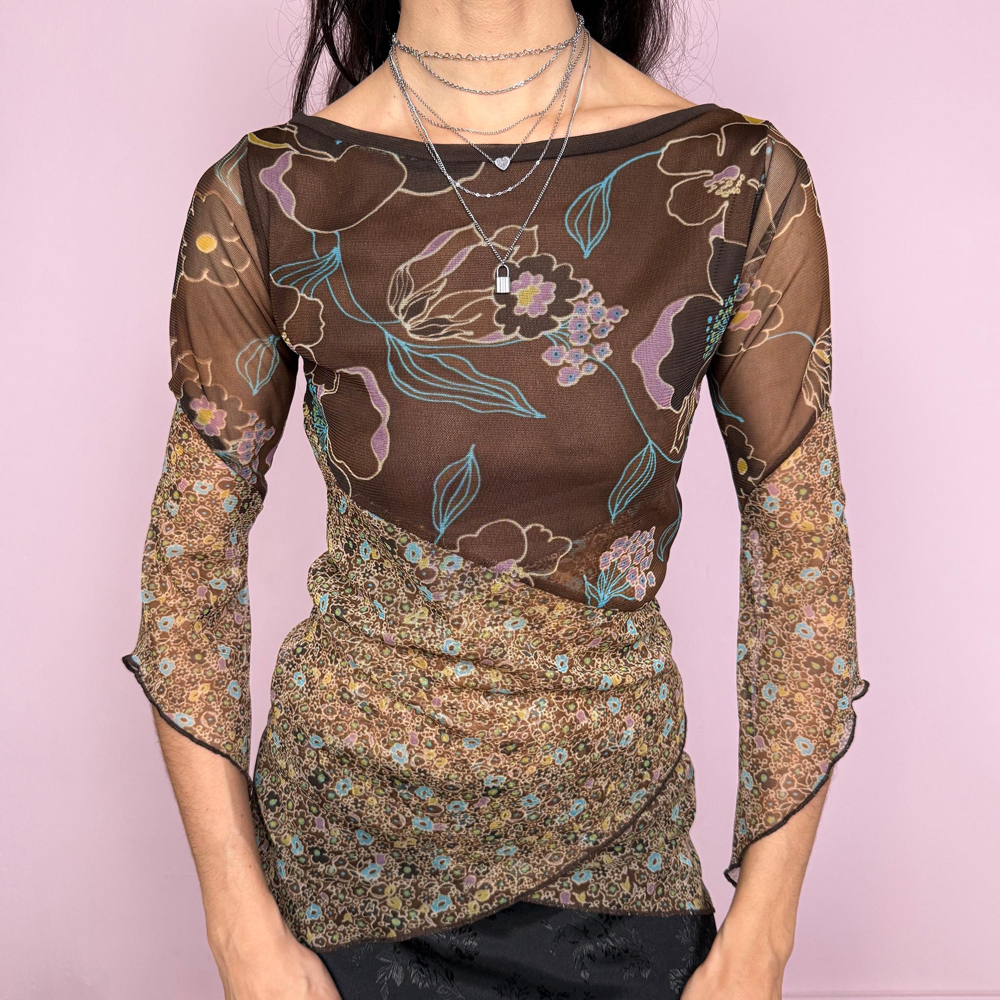 Vintage 2000s whimsical fairycore brown mesh 3/4 bell sleeve stretchy top with an asymmetric hem and two contrasting floral prints. Features a semi sheer lightweight feel with a fitted silhouette and flowing sleeves for a romantic look. Perfect for spring or summer wear. Made by a French brand. Excellent vintage condition.