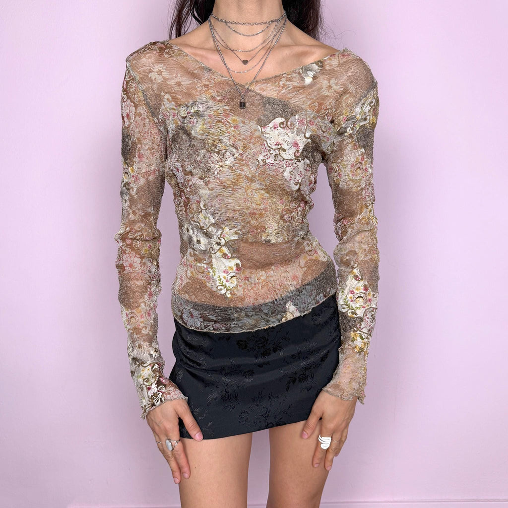 Vintage 2000s romantic sheer mesh long sleeve top featuring a floral print in brown and beige tones, with a fitted silhouette and a subtly draped wrap neckline. Detailed with embroidered tulle accents and a soft stretchy feel for a delicate ethereal fairycore look. Perfect for summer, evening, or party wear. Made in Italy from a 50% viscose and 50% polyester blend. Excellent vintage condition.