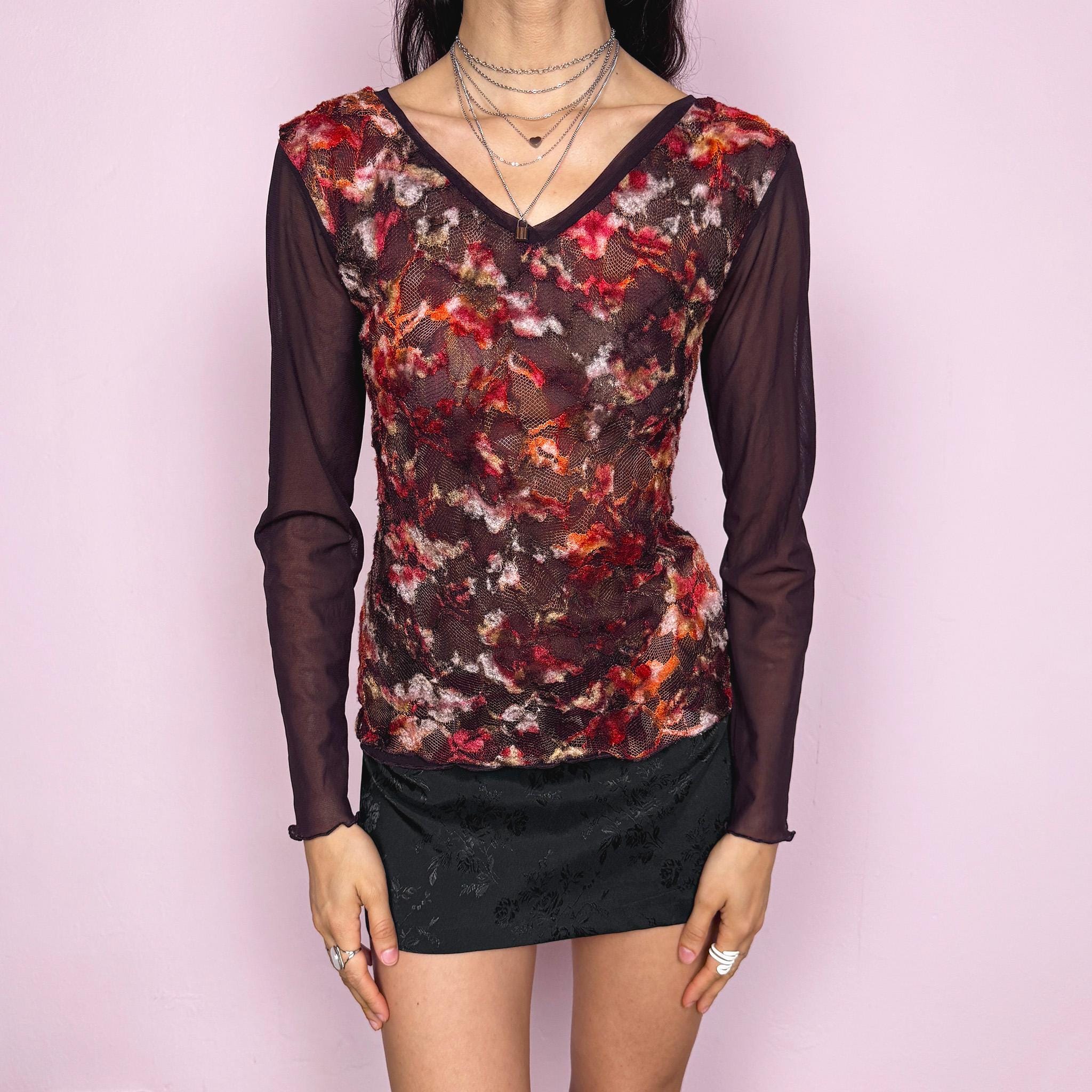 Vintage 2000s romantic dark purple semi sheer long sleeve top featuring layered mesh construction with a textured lace overlay in red and burgundy tones, creating a rich dimensional effect. Stretchy with a fitted silhouette, perfect for evening, spring, or night wear with a soft fairycore feel. Made in France from a polyester blend. Great vintage condition.