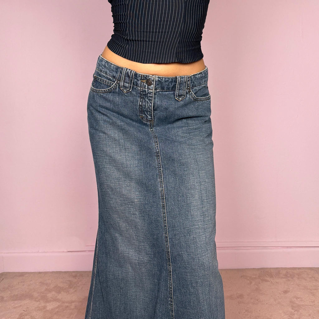 Vintage 2000s blue denim maxi skirt with a flared silhouette, classic five-pocket design, and front zip closure. Structured cotton denim with no stretch. Unique statement streetwear piece. Can be worn high waisted for size S or mid to low rise for size XS/XXS. Made from 100% cotton. Excellent vintage condition.