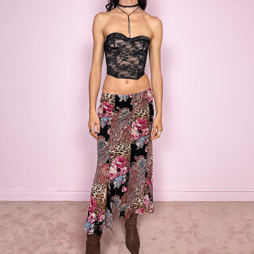 Vintage 2000s lace midi skirt with a whimsical maximalist mix of floral, paisley, and animal prints. Features multiple split hems and a stretchy elastic waistband for a flexible fit. Can be worn high waisted for size S or mid to low rise for XS. Made from a microfiber blend. Great vintage condition.
