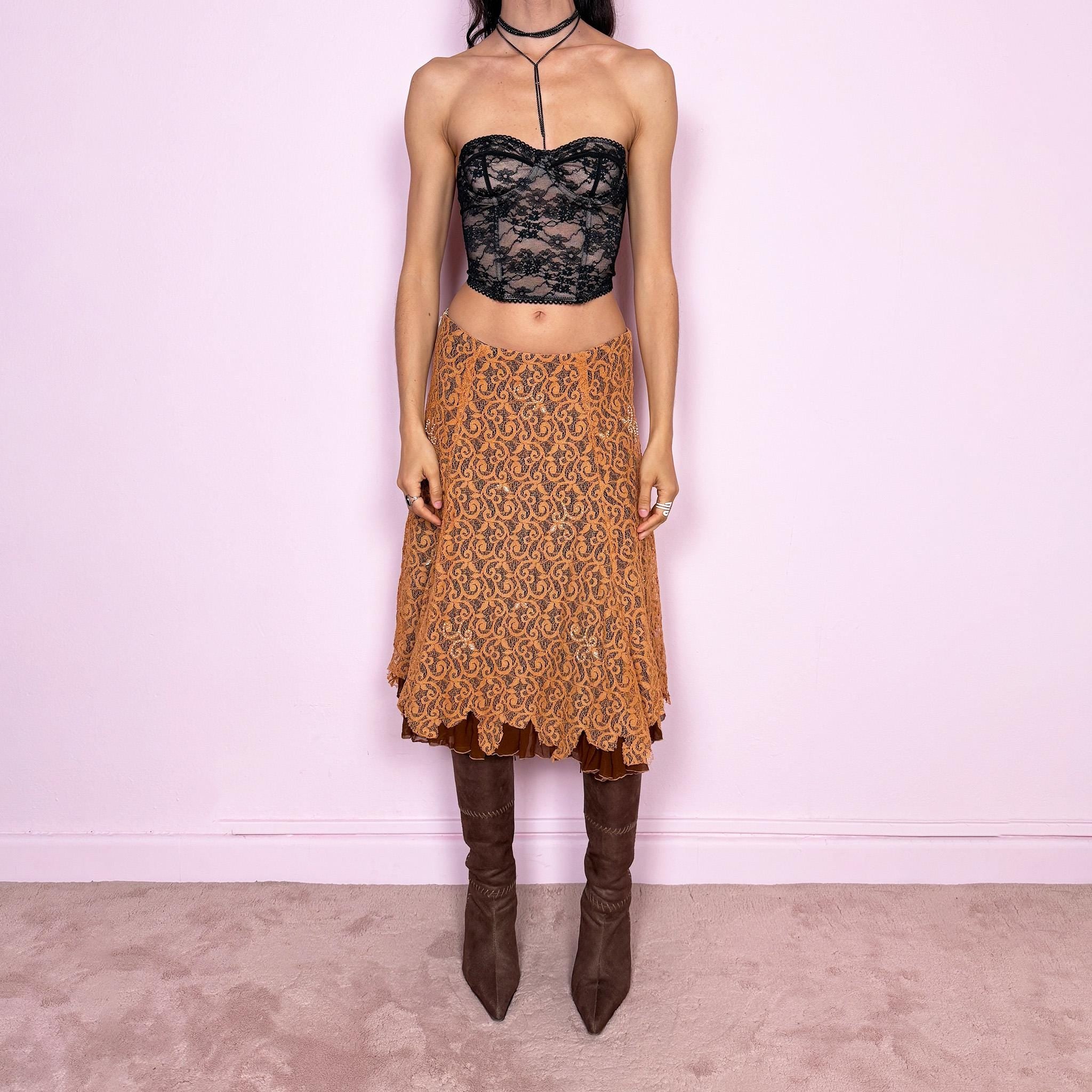 Vintage 2000s romantic fairycore orange brown lace midi skirt with a layered flared silhouette and soft ruffle hem. Features delicate white beaded details throughout and a side zip closure, no stretch. Can be worn high waisted for size M or mid to low rise for XS/S. Perfect for spring summer events. Great vintage condition.