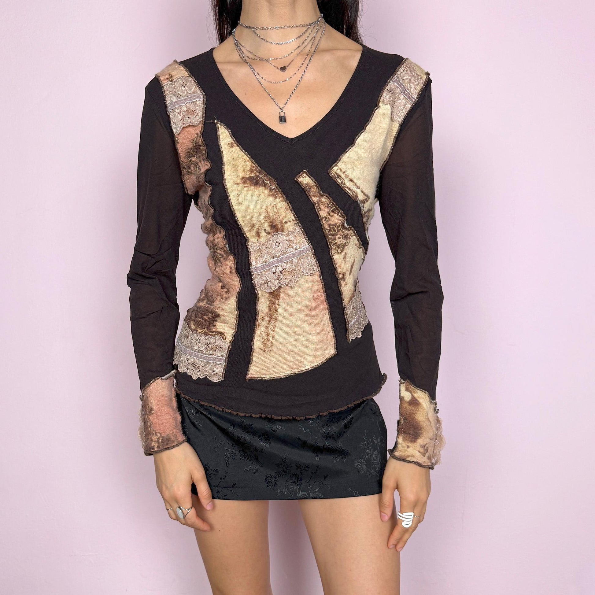 Vintage 2000s avant garde dark brown mesh long sleeve stretchy fitted top with a V-neck and wool appliqué details. Features a semi sheer base with raw edge paneling and textured contrast inserts for a unique deconstructed look. Perfect for spring or autumn layering. Made in Italy. Excellent vintage condition.