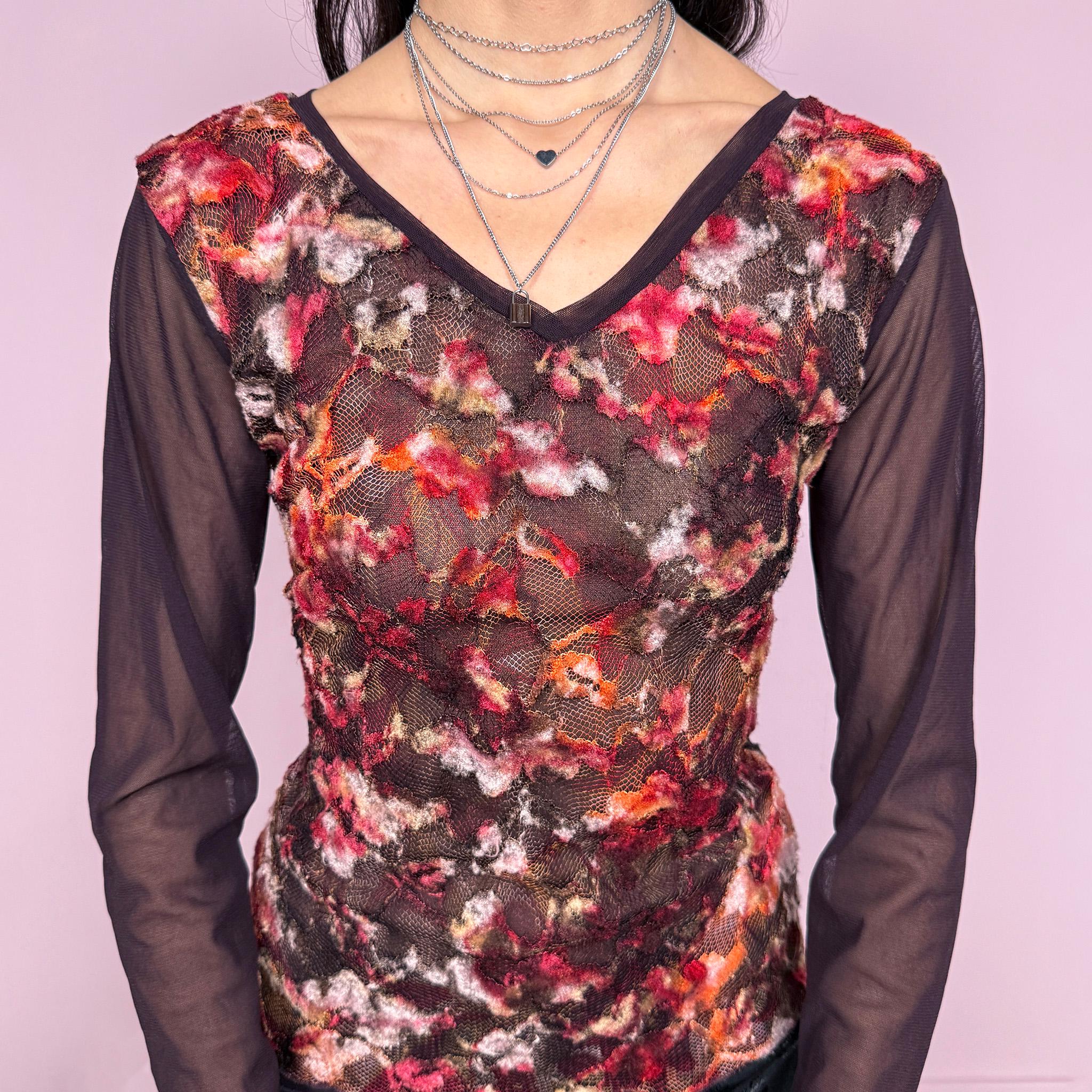 Vintage 2000s romantic dark purple semi sheer long sleeve top featuring layered mesh construction with a textured lace overlay in red and burgundy tones, creating a rich dimensional effect. Stretchy with a fitted silhouette, perfect for evening, spring, or night wear with a soft fairycore feel. Made in France from a polyester blend. Great vintage condition.