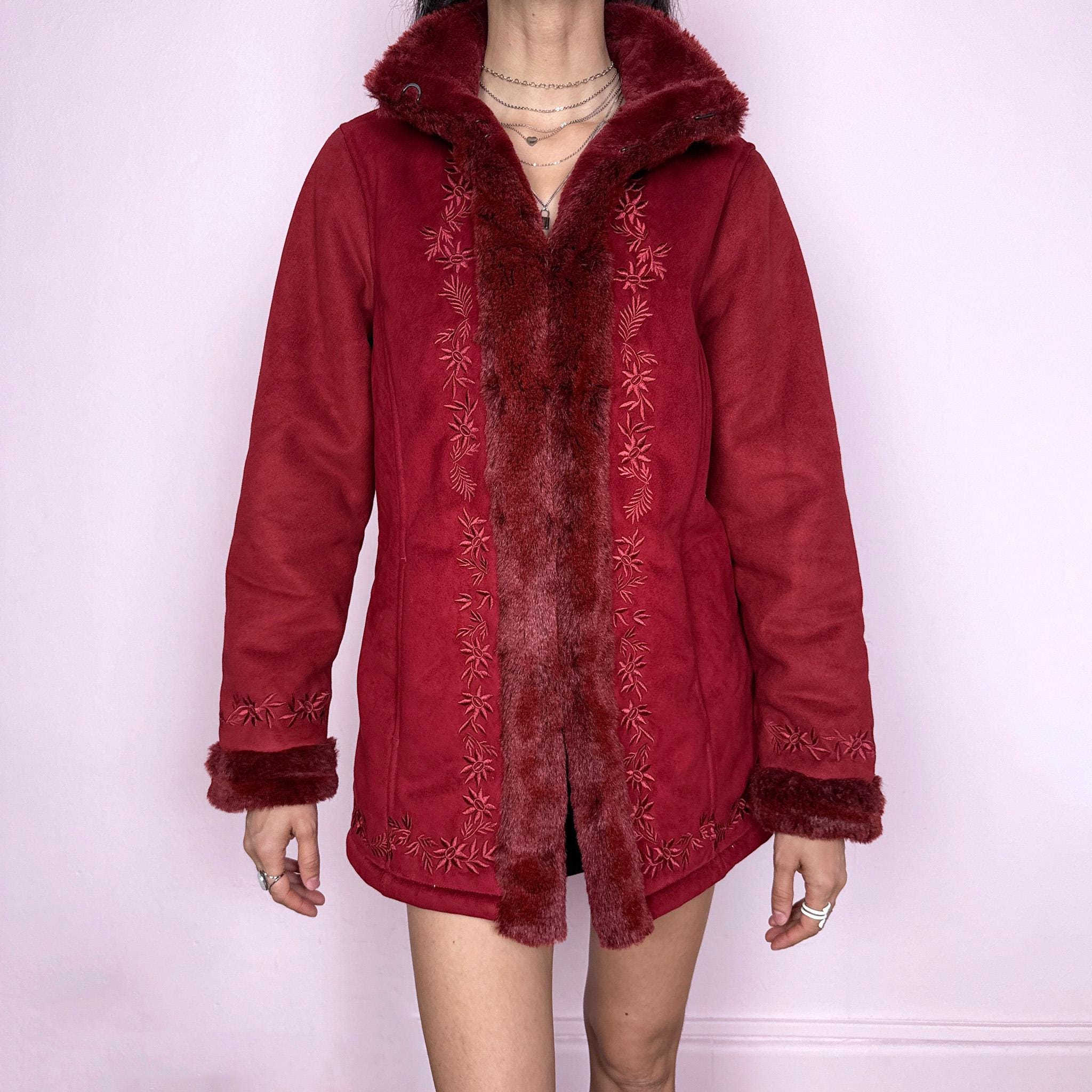 Vintage 2000s Penny Lane style coat in a deep red tone featuring rich embroidery and plush faux fur trim at the collar, cuffs, and interior. Designed with a cozy structured fit, pockets, and hook closure for a bold bohemian statement. Perfect for winter with a soft fairycore feel. Made from a polyester acrylic blend. Excellent vintage condition.