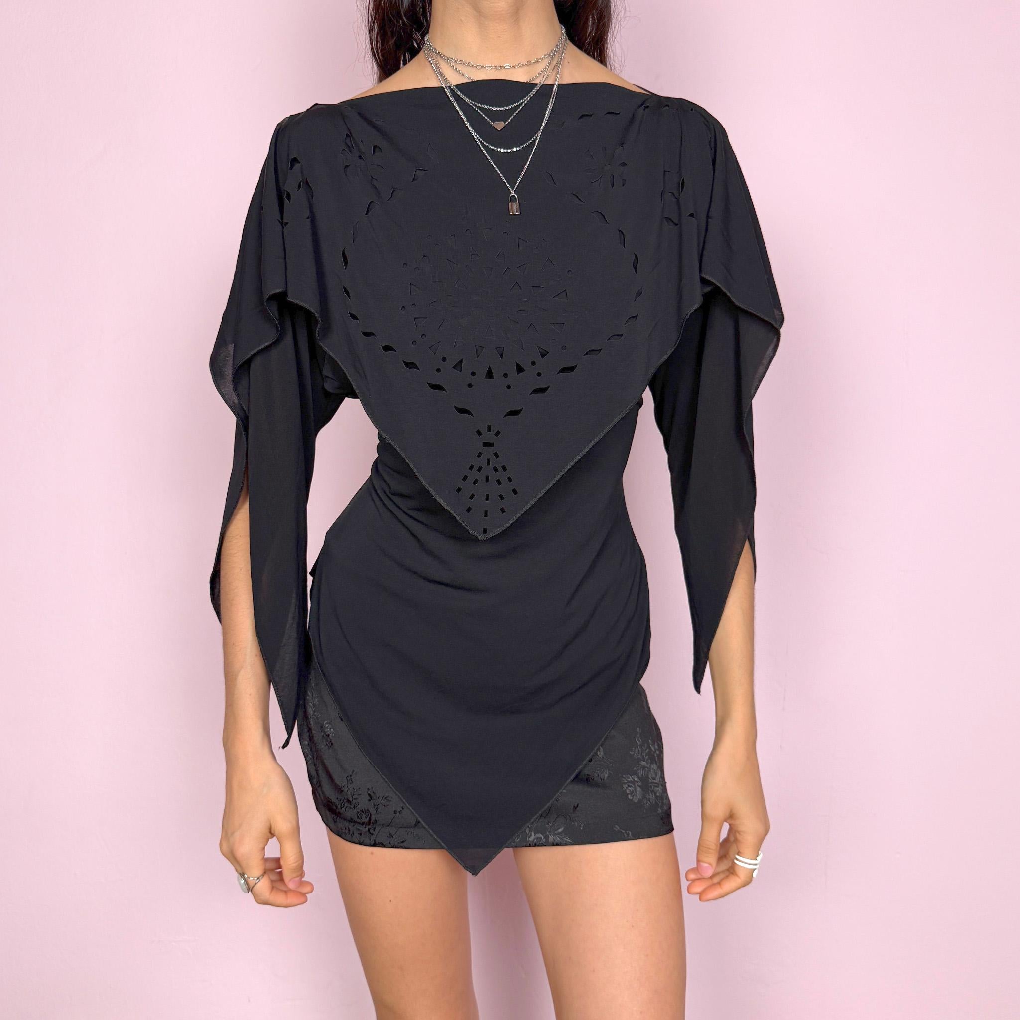 Vintage 2000s dark avant garde fitted top with a boat neckline and dramatic split sleeves. Features a layered deconstructed design with cut out detailing, asymmetric pointed hem, and fluid draped panels. Stretchy and sculpting silhouette. Made in France by a French brand from an acetate, elastane, and polyamide blend. Unique statement piece. Excellent vintage condition.