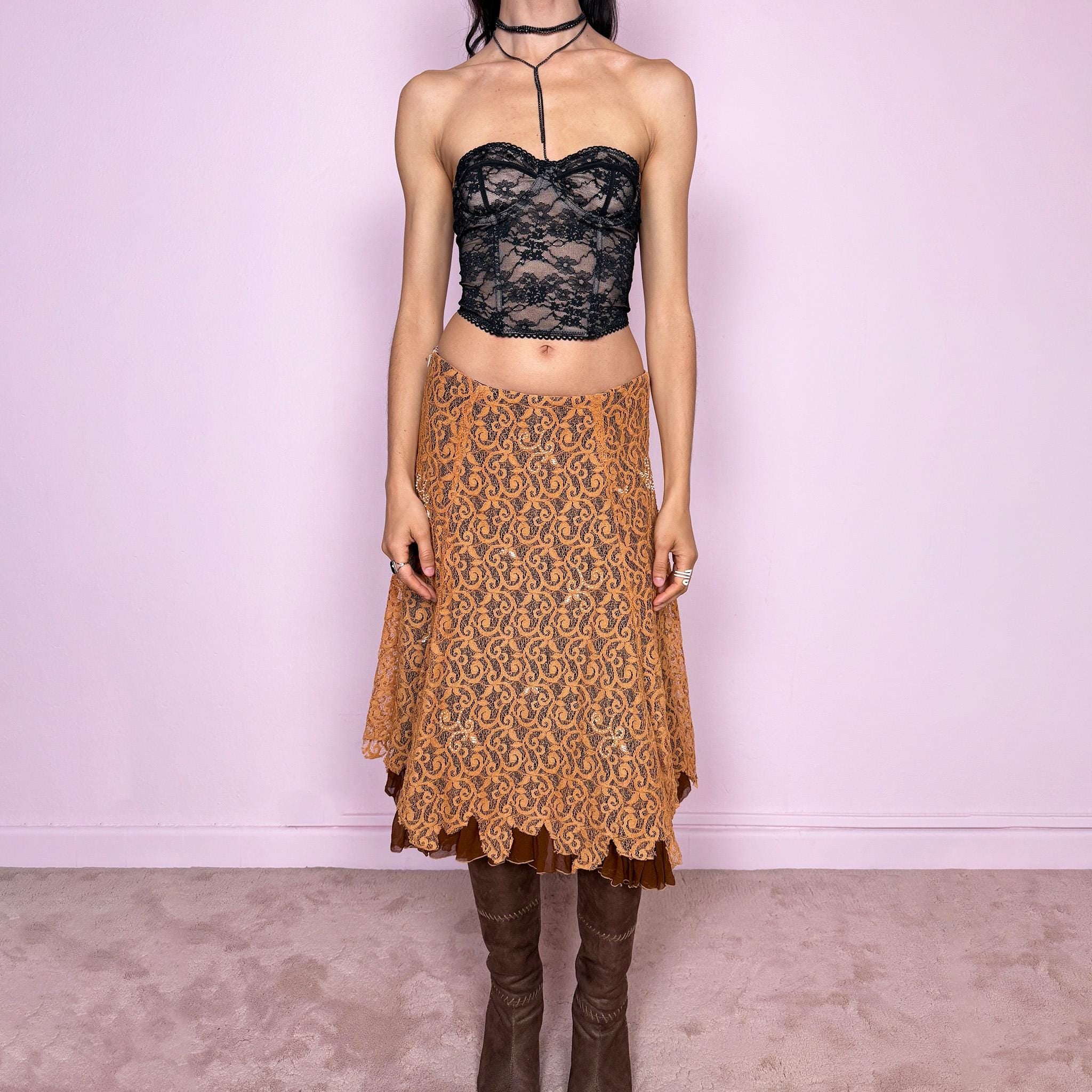Vintage 2000s romantic fairycore orange brown lace midi skirt with a layered flared silhouette and soft ruffle hem. Features delicate white beaded details throughout and a side zip closure, no stretch. Can be worn high waisted for size M or mid to low rise for XS/S. Perfect for spring summer events. Great vintage condition.
