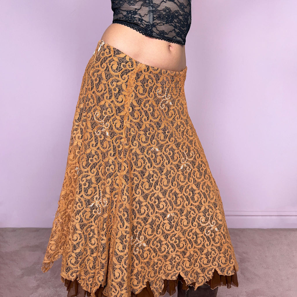 Vintage 2000s romantic fairycore orange brown lace midi skirt with a layered flared silhouette and soft ruffle hem. Features delicate white beaded details throughout and a side zip closure, no stretch. Can be worn high waisted for size M or mid to low rise for XS/S. Perfect for spring summer events. Great vintage condition.