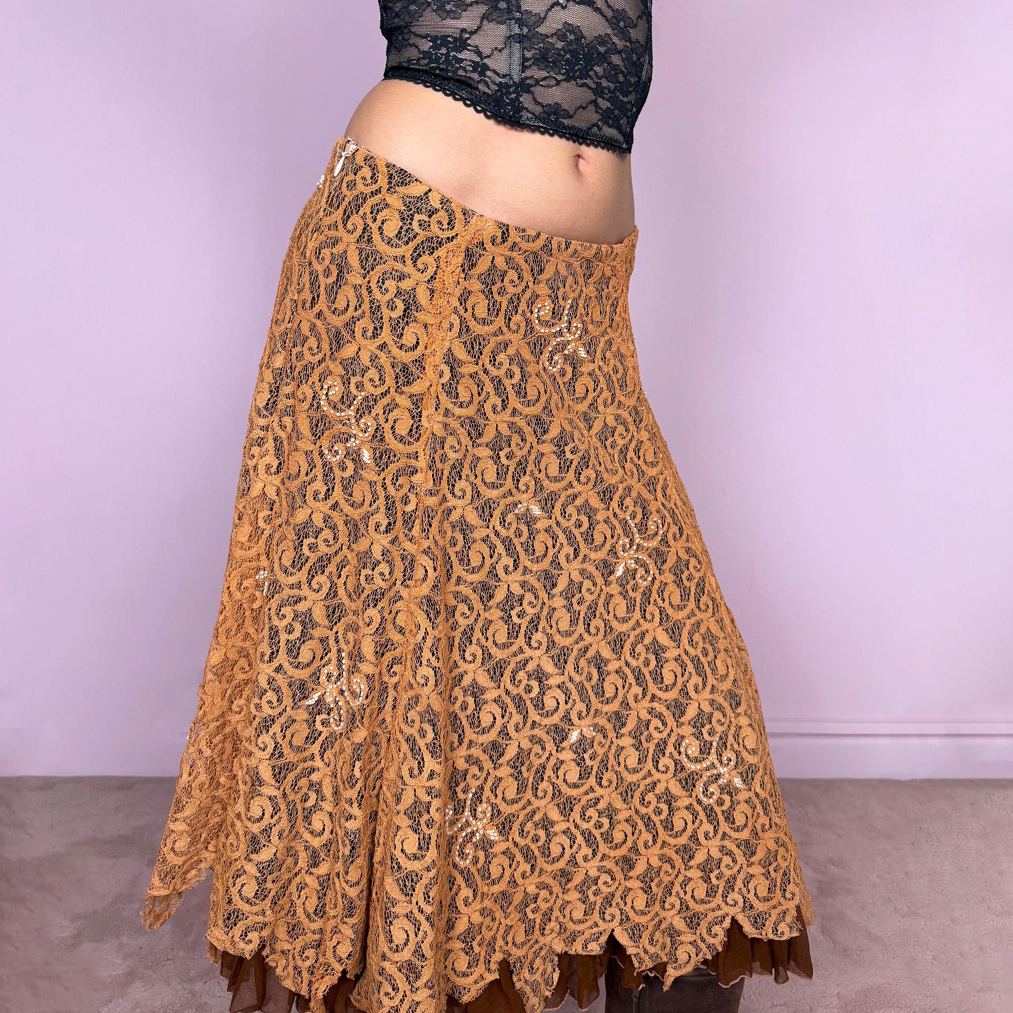 Vintage 2000s romantic fairycore orange brown lace midi skirt with a layered flared silhouette and soft ruffle hem. Features delicate white beaded details throughout and a side zip closure, no stretch. Can be worn high waisted for size M or mid to low rise for XS/S. Perfect for spring summer events. Great vintage condition.