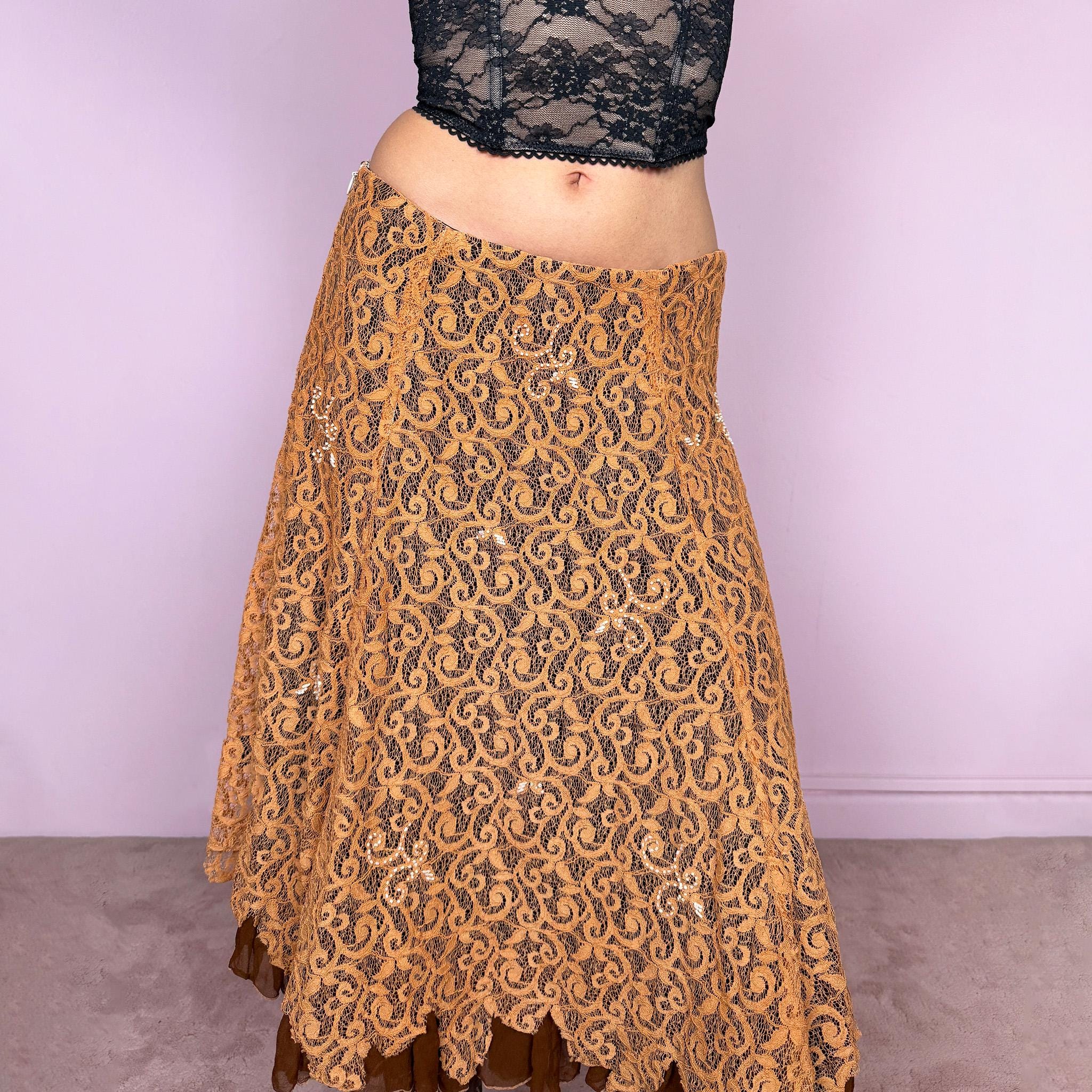 Vintage 2000s romantic fairycore orange brown lace midi skirt with a layered flared silhouette and soft ruffle hem. Features delicate white beaded details throughout and a side zip closure, no stretch. Can be worn high waisted for size M or mid to low rise for XS/S. Perfect for spring summer events. Great vintage condition.