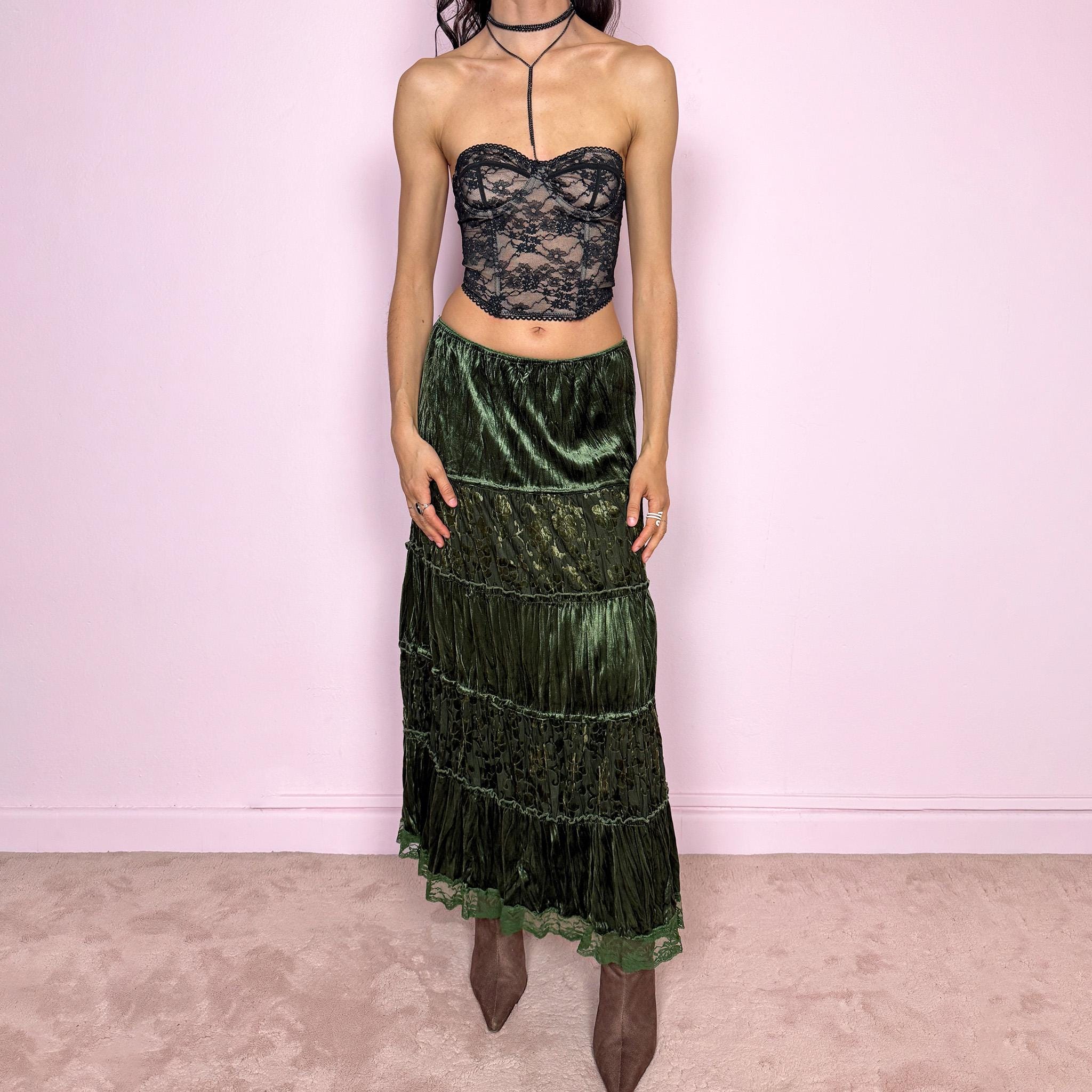 Vintage 2000s green velvet midi skirt with a whimsical fairycore boho feel. Features a tiered construction with burnout mesh floral panels and a soft crinkled texture. Stretchy elastic waistband for flexible fit. Can be worn high waisted for size M or lower for size S. Made by a French brand from polyester. Excellent vintage condition.
