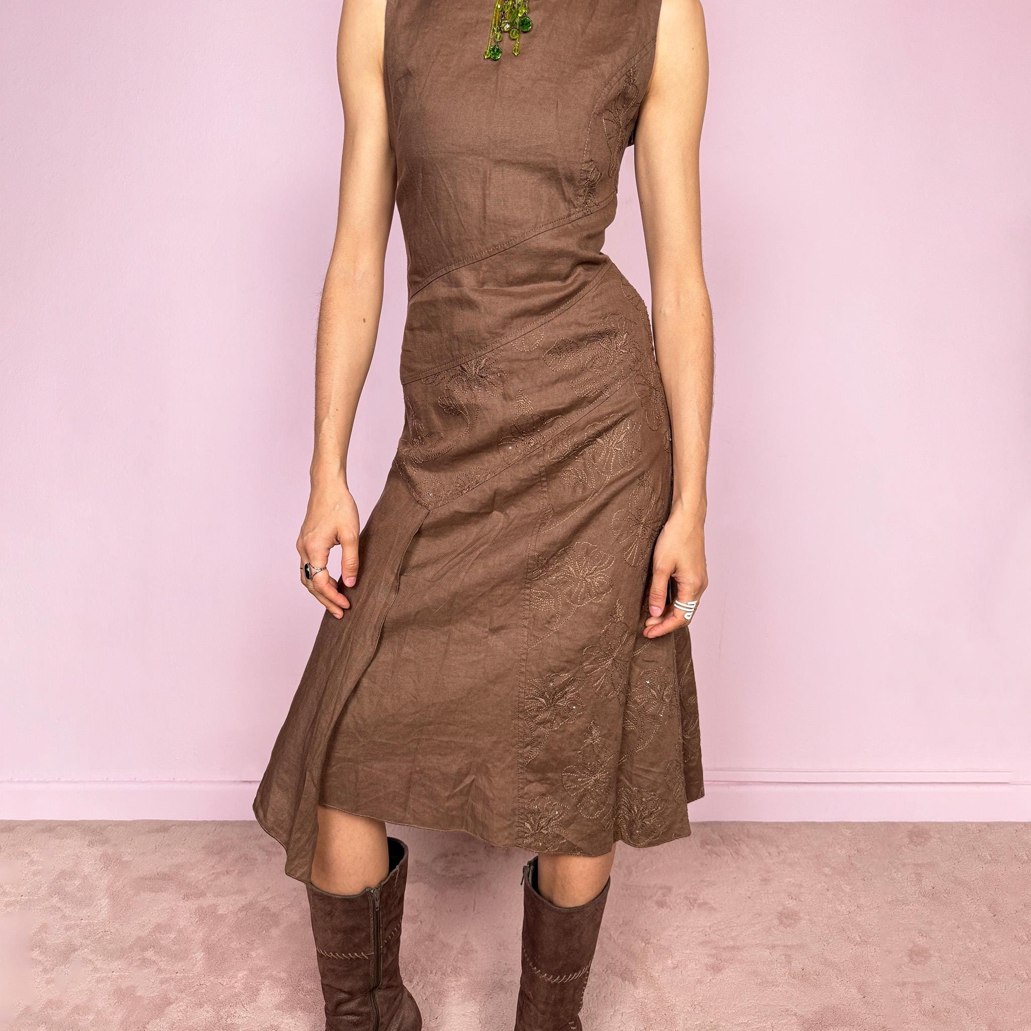 Vintage 2000s brown sleeveless midi dress with a deconstructed paneled layered design. Features floral embroidered details, asymmetric draping, and side zip closure with a non-stretch fit. Perfect for summer fairy styling or avant-garde everyday looks. Composition tag missing, feels like linen or ramie. Made by a French brand. Great vintage condition.