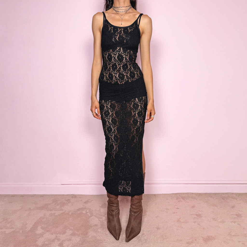 Vintage 90s stunning black lace semi sheer maxi slip dress with a super flattering body-skimming stretchy fit and elegant side slit. Features delicate straps, floral lace texture and a romantic elongated silhouette. Perfect for parties, festivals, lingerie-as-outerwear styling or intimate date nights. Made from nylon. Great vintage condition.