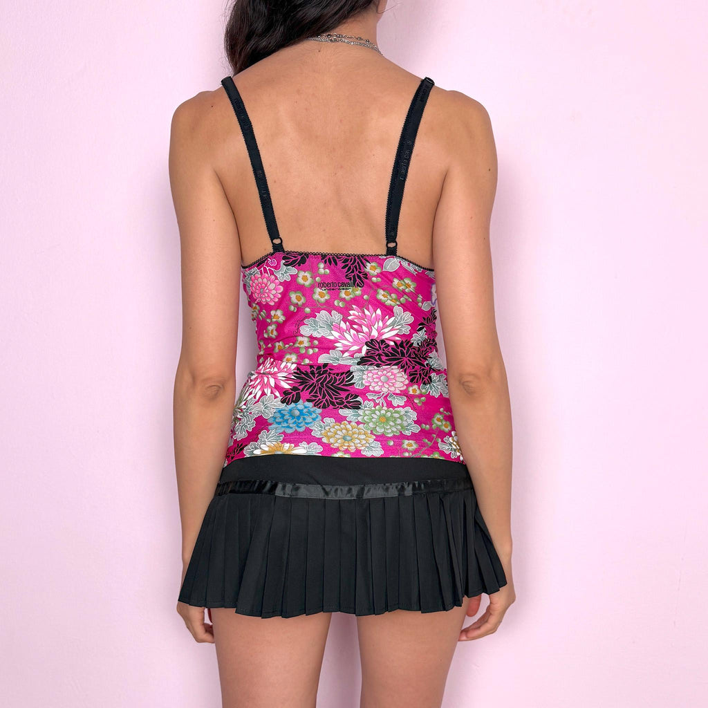Vintage 2000s statement fitted cami top by Roberto Cavalli Underwear in vivid fuchsia pink with bold all-over floral print. Soft stretchy body-skimming fit with deep V neckline, adjustable straps and delicate black satin bow detail at the bust. Iconic maximalist Y2K glam piece. Made from a polyamide elastane blend. Excellent vintage condition.