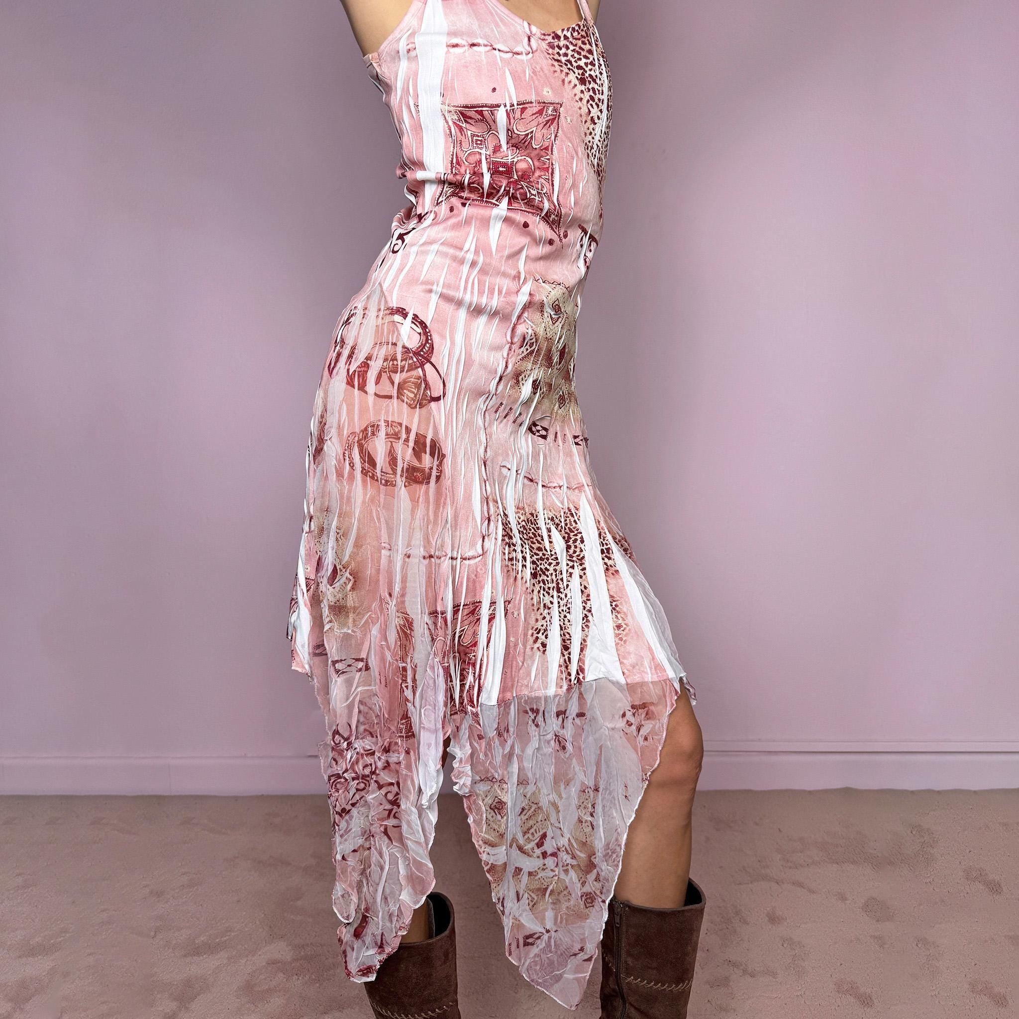 Vintage 2000s slip dress with thin straps, a fitted body-skimming silhouette, pink and burgundy abstract bohemian print over a white crinkle-textured base, semi-sheer lightweight fabric and a dramatic asymmetric handkerchief hem. Dreamy fairy grunge Y2K statement dress with a romantic summer feel. Made in France from a polyester-elastane blend. Excellent vintage condition.