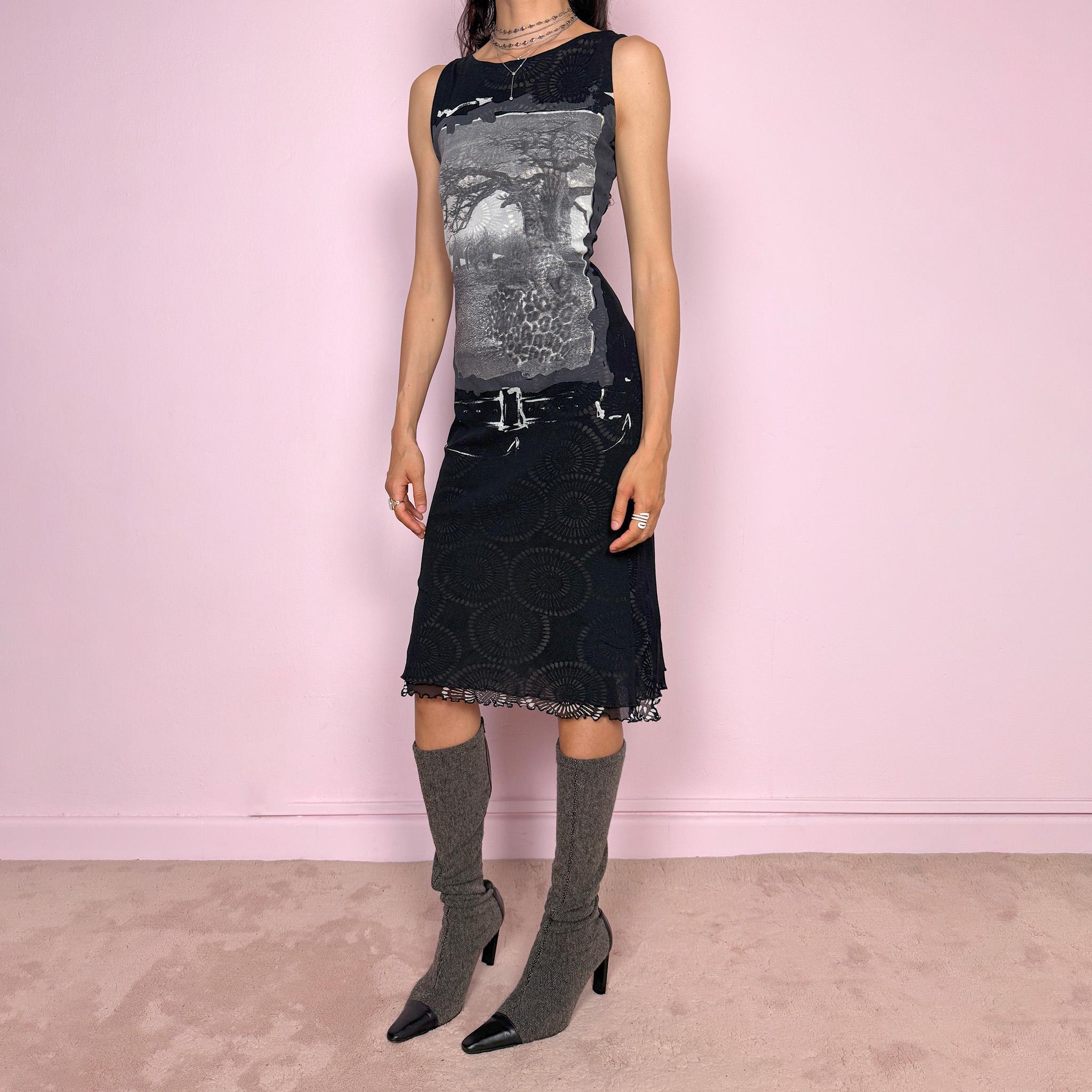 Vintage 2000s black semi-sheer mesh midi dress with a dark avant-garde deconstructed look. Sleeveless and stretchy with an abstract graphic print, mixed mesh paneling and a fitted silhouette. Made from polyamide and polyester. Great vintage condition.
