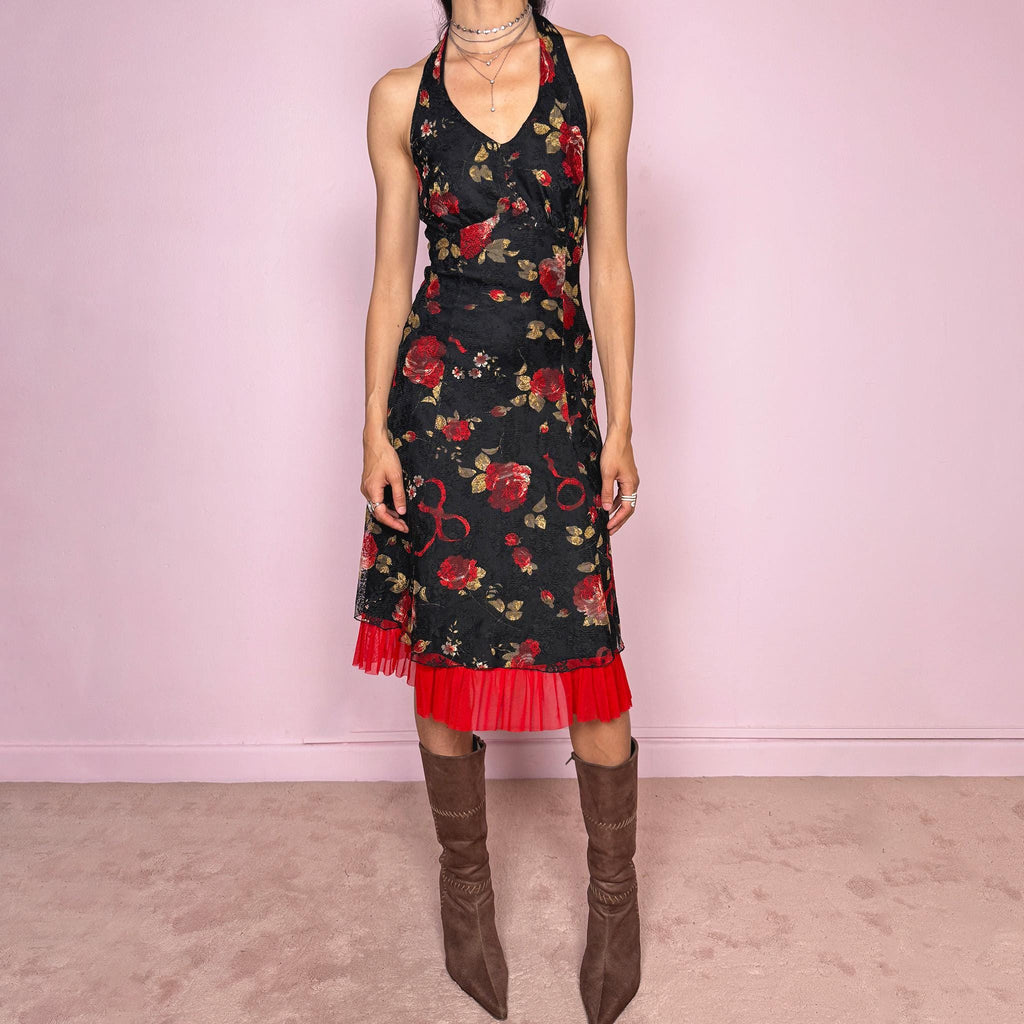 Vintage 2000s black halter tie-neck midi dress with a stretchy fit, V-neckline, backless cut, and side zip closure. Features black lining, a lace mesh overlay with rose print, and a dreamy red ruffle mesh hem. Romantic, feminine, and elegant for summer. Excellent vintage condition.