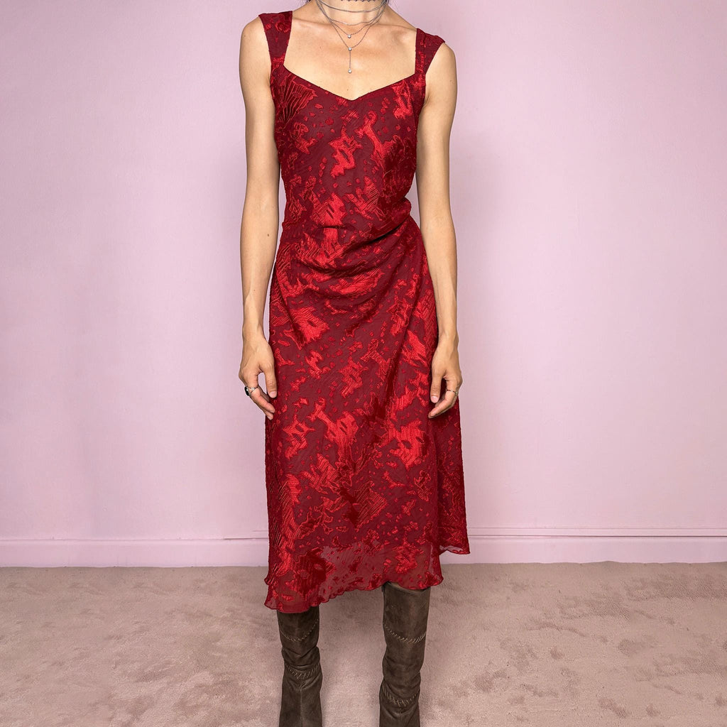 Vintage 2000s red and burgundy flared midi dress in a rich textured fabric with a semi-sheer abstract effect throughout and wide shoulder straps. The deep red tone and texture give the piece a romantic 90s / early 2000s evening feel, perfect for date nights and special occasions. Made from non-stretch polyester. Excellent vintage condition.