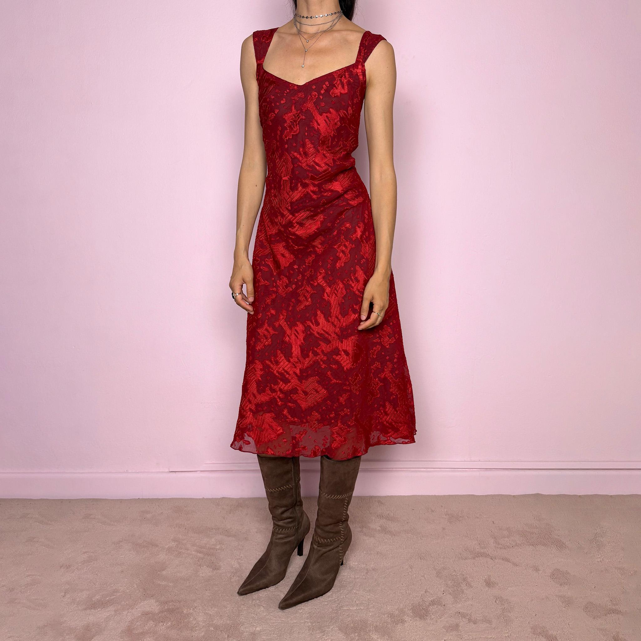 Vintage 2000s red and burgundy flared midi dress in a rich textured fabric with a semi-sheer abstract effect throughout and wide shoulder straps. The deep red tone and texture give the piece a romantic 90s / early 2000s evening feel, perfect for date nights and special occasions. Made from non-stretch polyester. Excellent vintage condition.