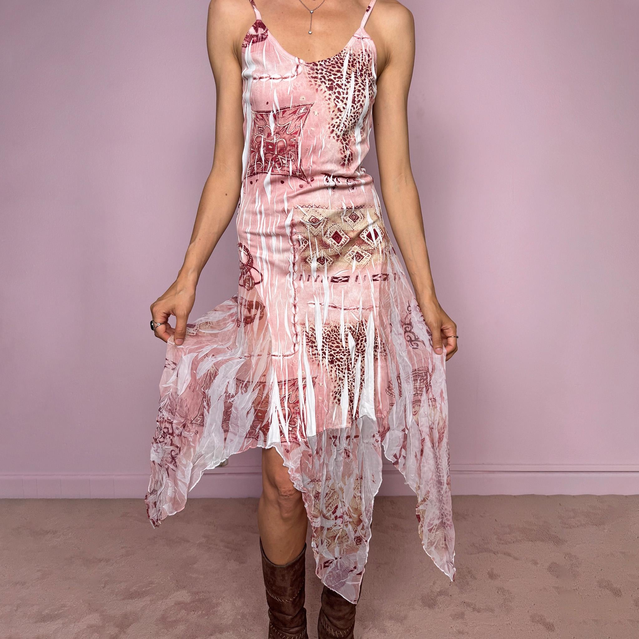 Vintage 2000s slip dress with thin straps, a fitted body-skimming silhouette, pink and burgundy abstract bohemian print over a white crinkle-textured base, semi-sheer lightweight fabric and a dramatic asymmetric handkerchief hem. Dreamy fairy grunge Y2K statement dress with a romantic summer feel. Made in France from a polyester-elastane blend. Excellent vintage condition.