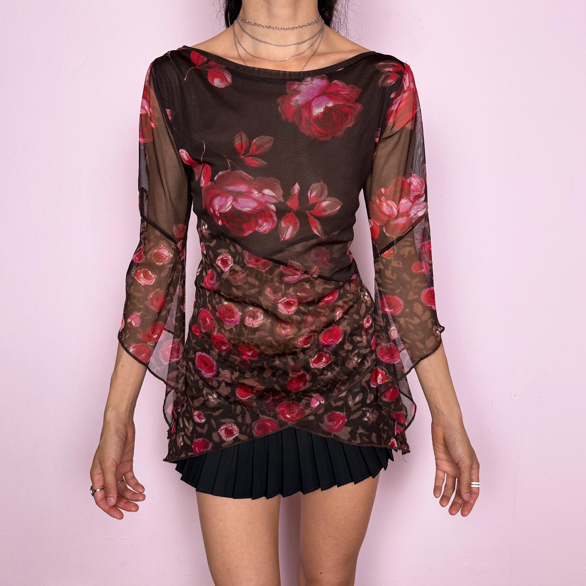 Vintage 2000s brown sheer mesh top with a fitted stretchy silhouette, asymmetric draped layered construction, wide boat neckline, and 3/4 bell sleeves. Red and pink floral rose print gives a romantic fairycore Y2K statement look. From a French brand. Fabric composition label is missing. Excellent vintage condition.