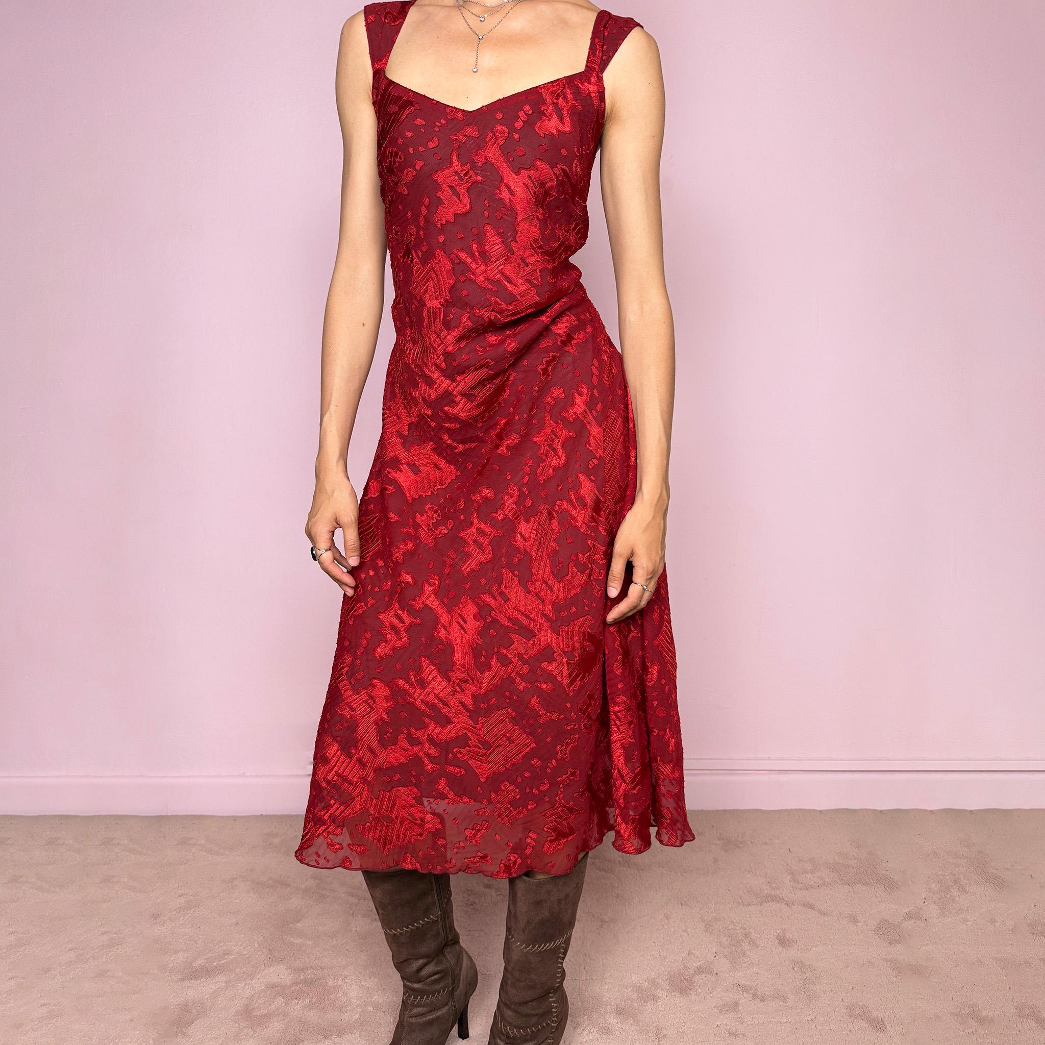 Vintage 2000s red and burgundy flared midi dress in a rich textured fabric with a semi-sheer abstract effect throughout and wide shoulder straps. The deep red tone and texture give the piece a romantic 90s / early 2000s evening feel, perfect for date nights and special occasions. Made from non-stretch polyester. Excellent vintage condition.