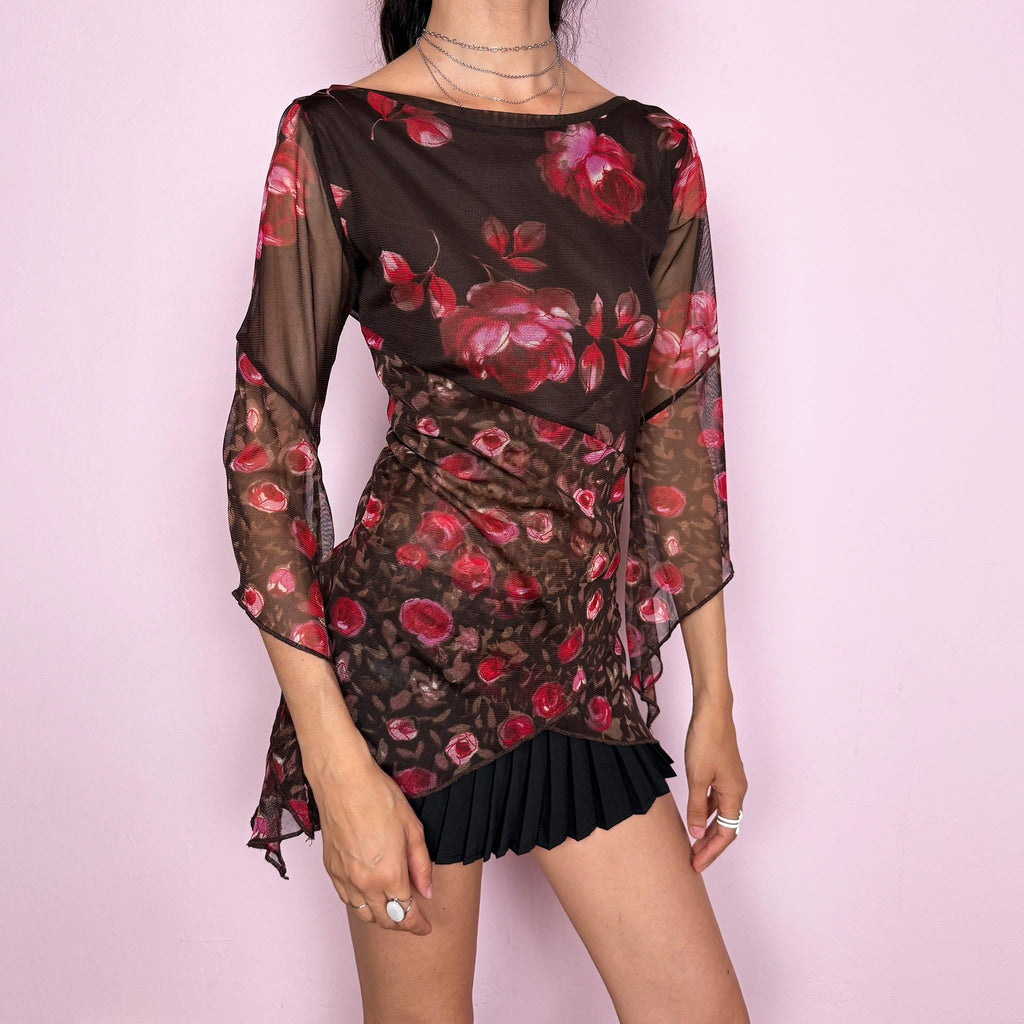Vintage 2000s brown sheer mesh top with a fitted stretchy silhouette, asymmetric draped layered construction, wide boat neckline, and 3/4 bell sleeves. Red and pink floral rose print gives a romantic fairycore Y2K statement look. From a French brand. Fabric composition label is missing. Excellent vintage condition.