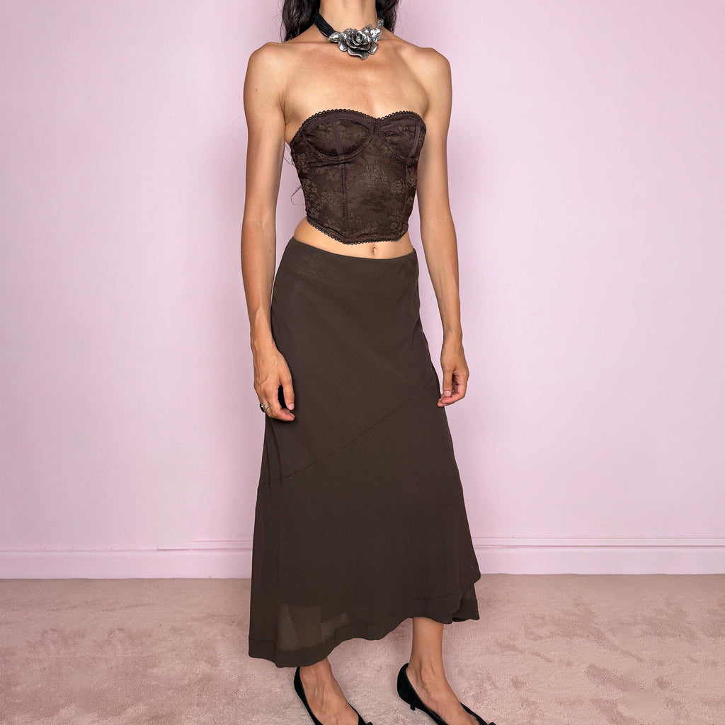 Vintage 2000s Alberta Ferretti brown A-line skirt, made in Italy from a 90% virgin wool and 10% nylon blend. Designed with a side zip closure, no stretch, and an asymmetric layered panel. An elegant and versatile Italian designer piece. Can be worn high-waisted on size S, or slightly lower on the waist for XS and XXS. Excellent vintage condition.